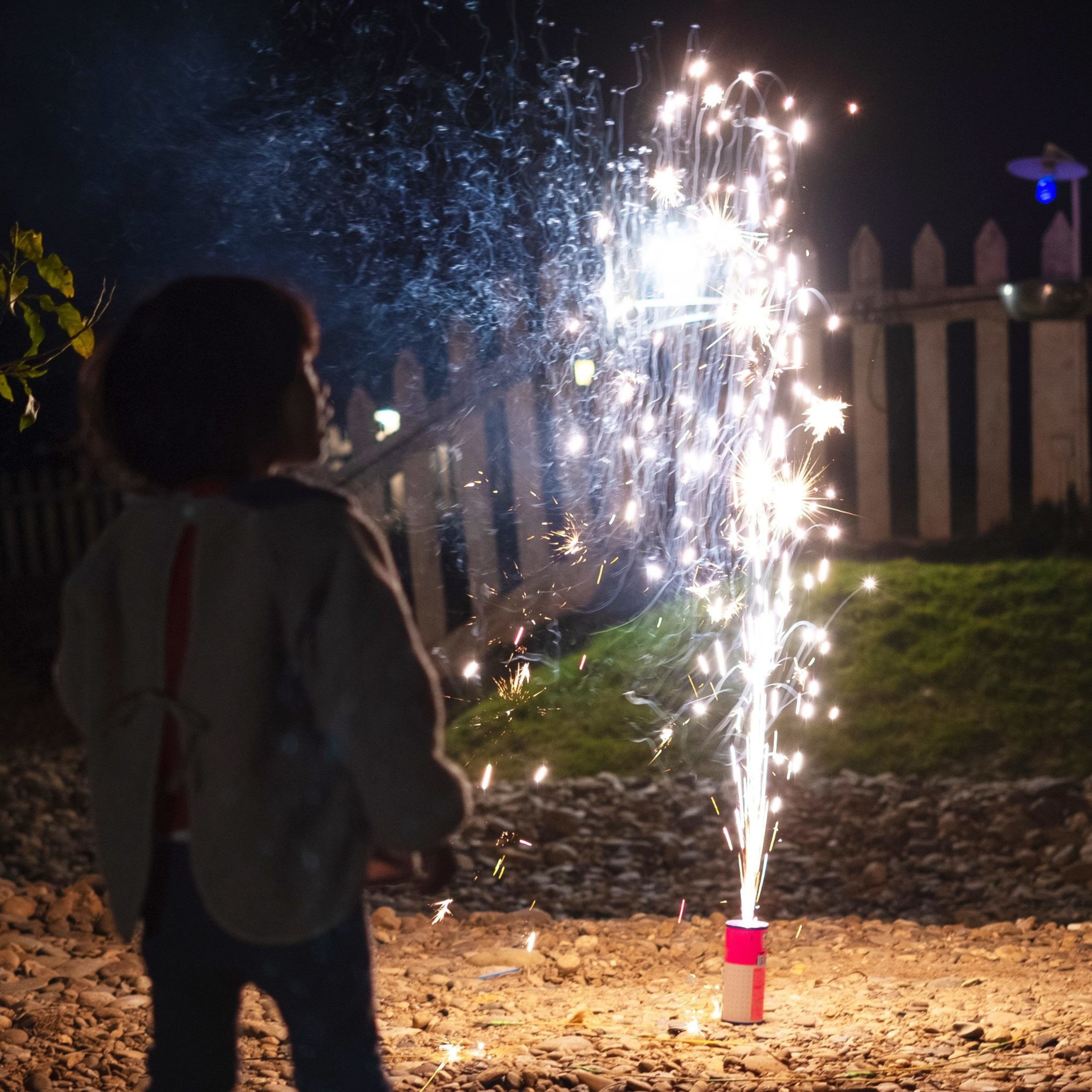 A child watches fireworks.