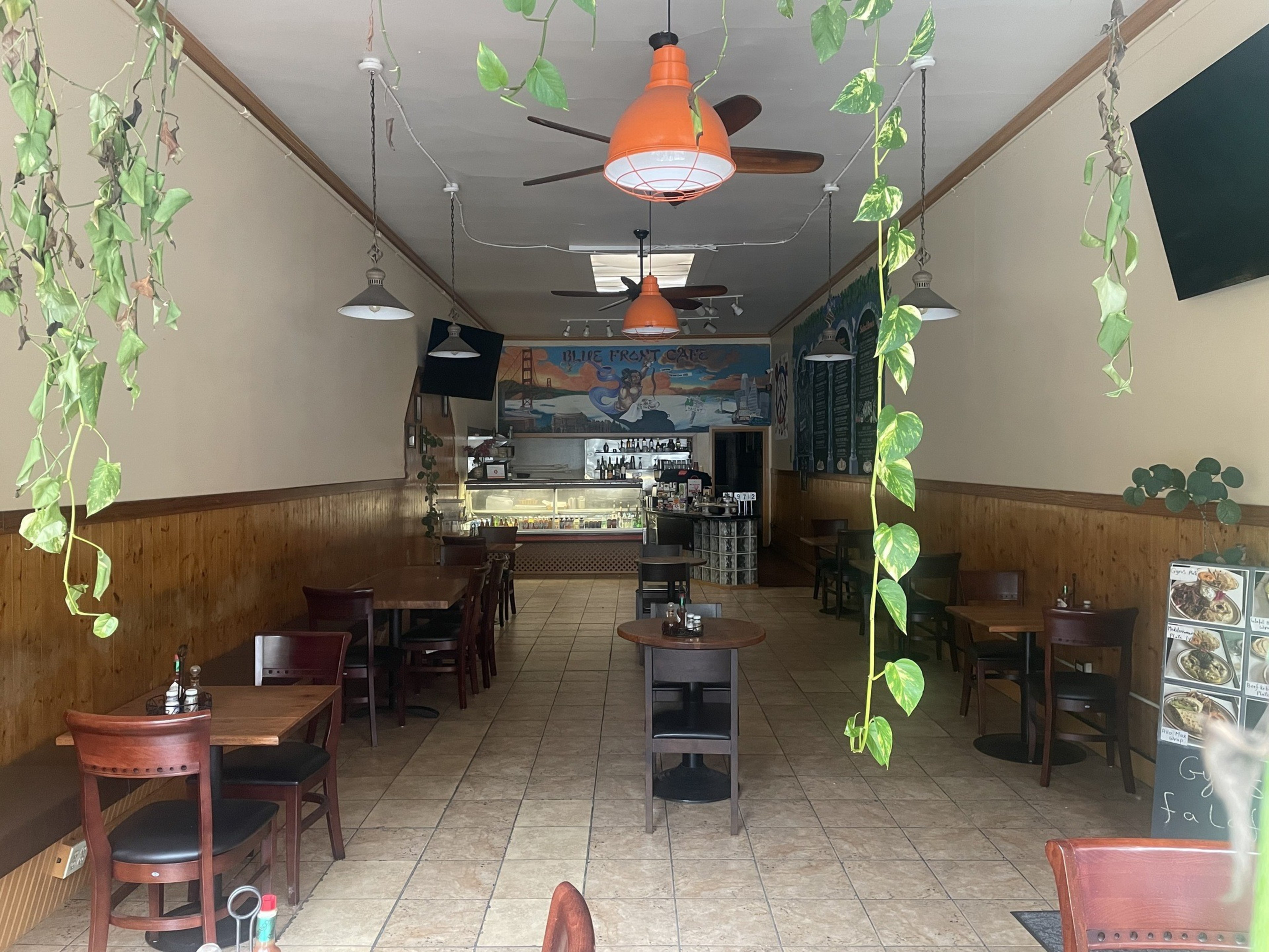 The inside of a restaurant sits empty.