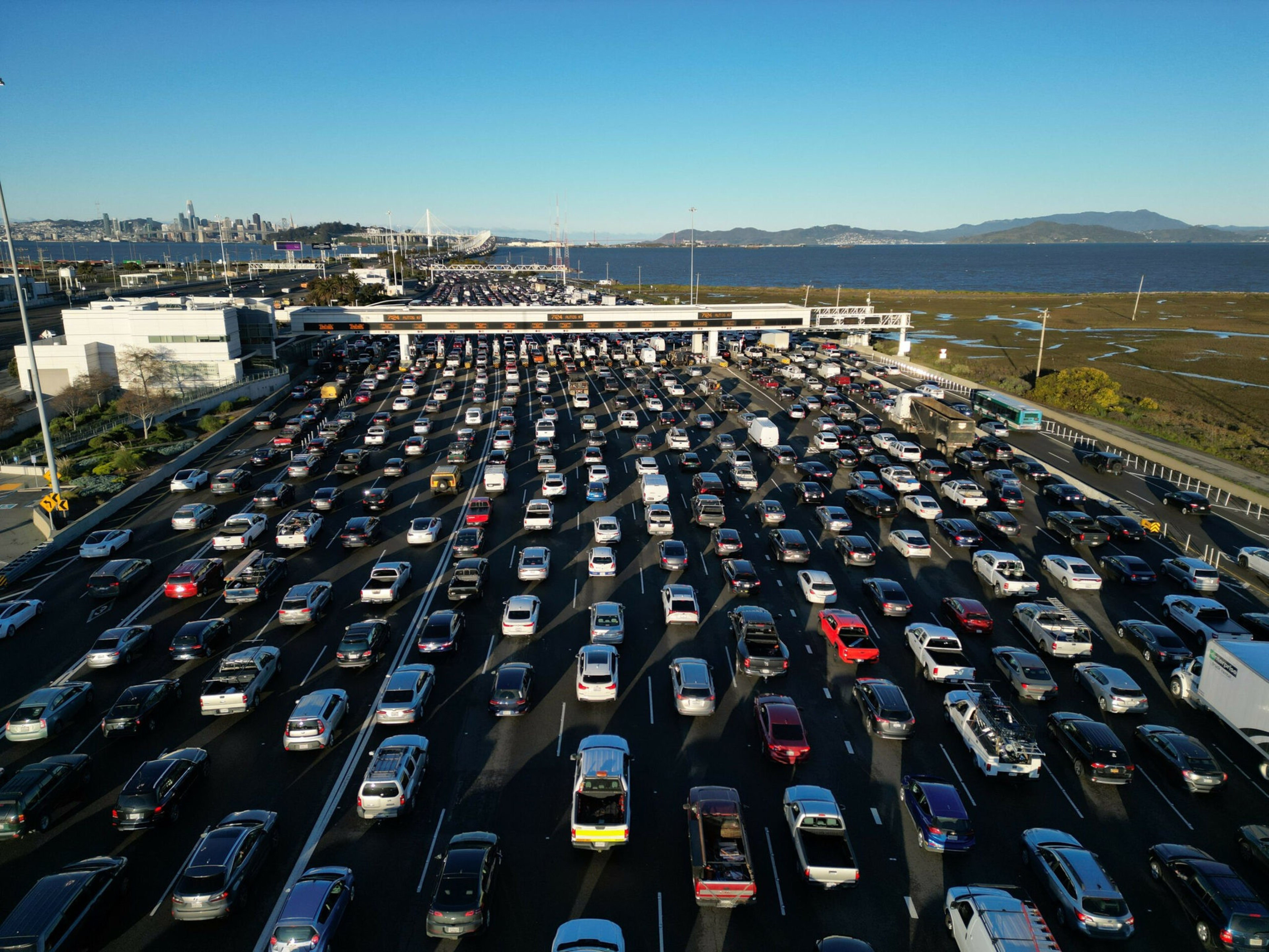 A multi lane highway backed up with traffic