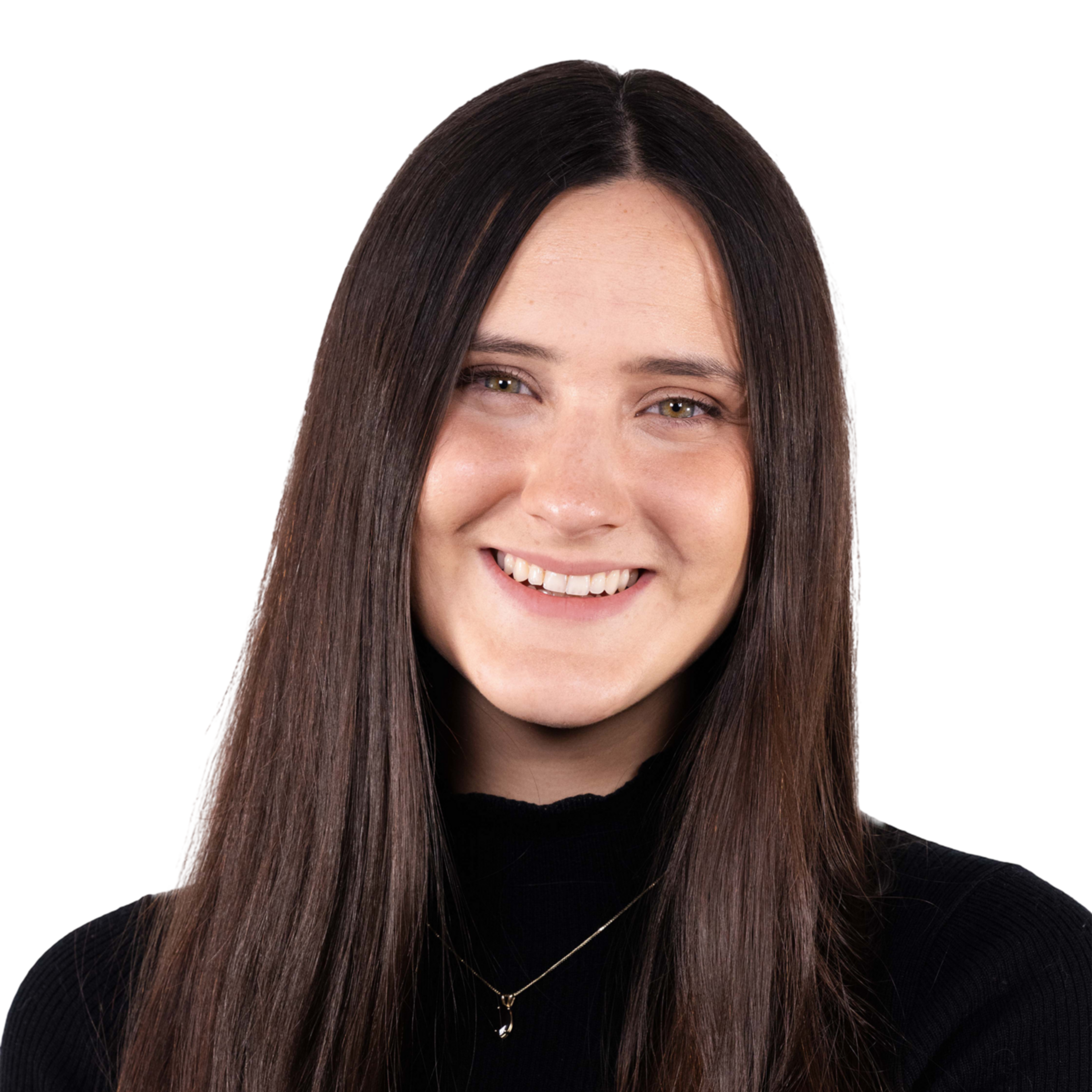 A young woman with long, straight dark brown hair smiles warmly, wearing a black top and a delicate necklace with a small pendant.
