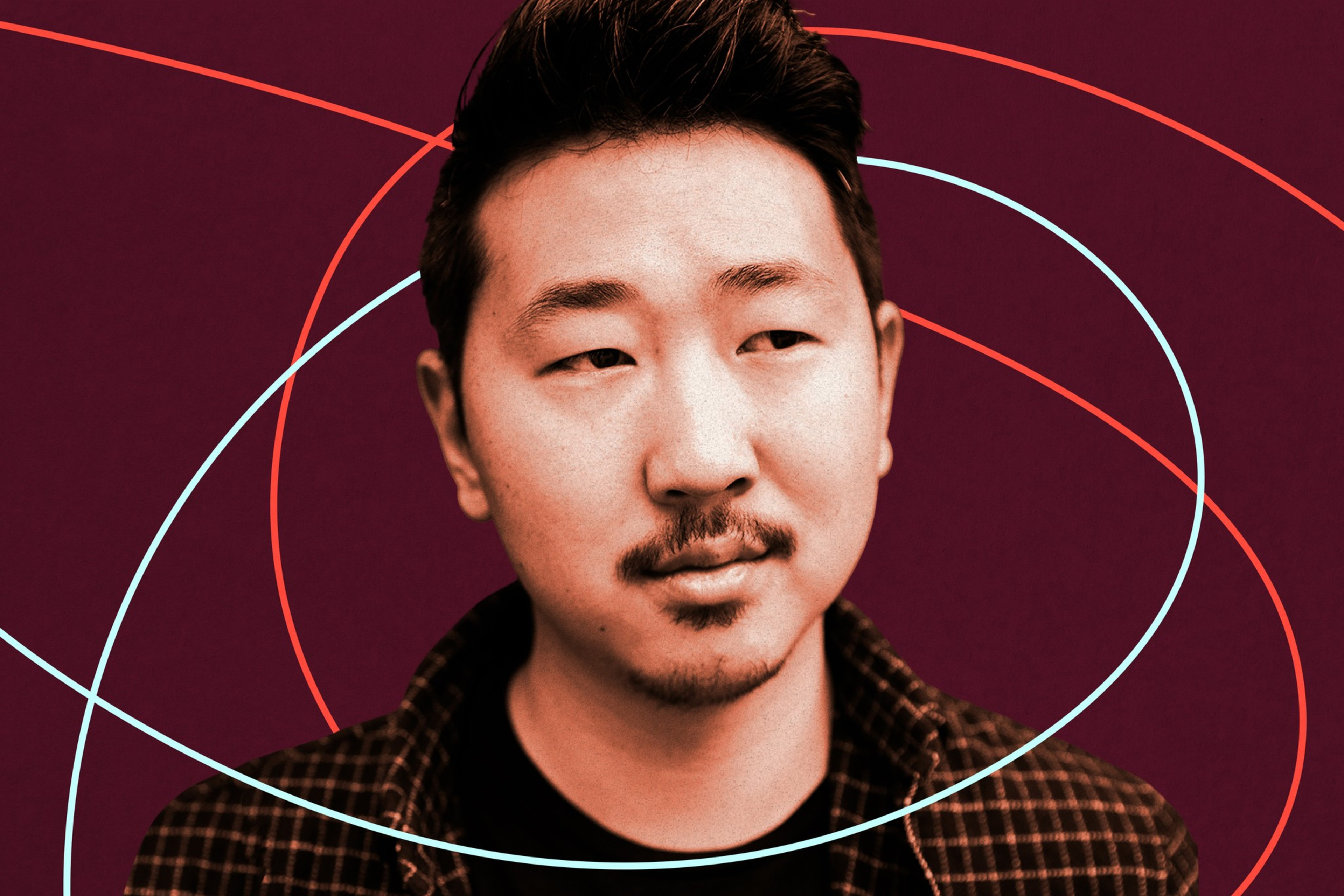 A man with short dark hair and light facial hair looks slightly to the side, wearing a checkered jacket against a dark red background with swirling lines.