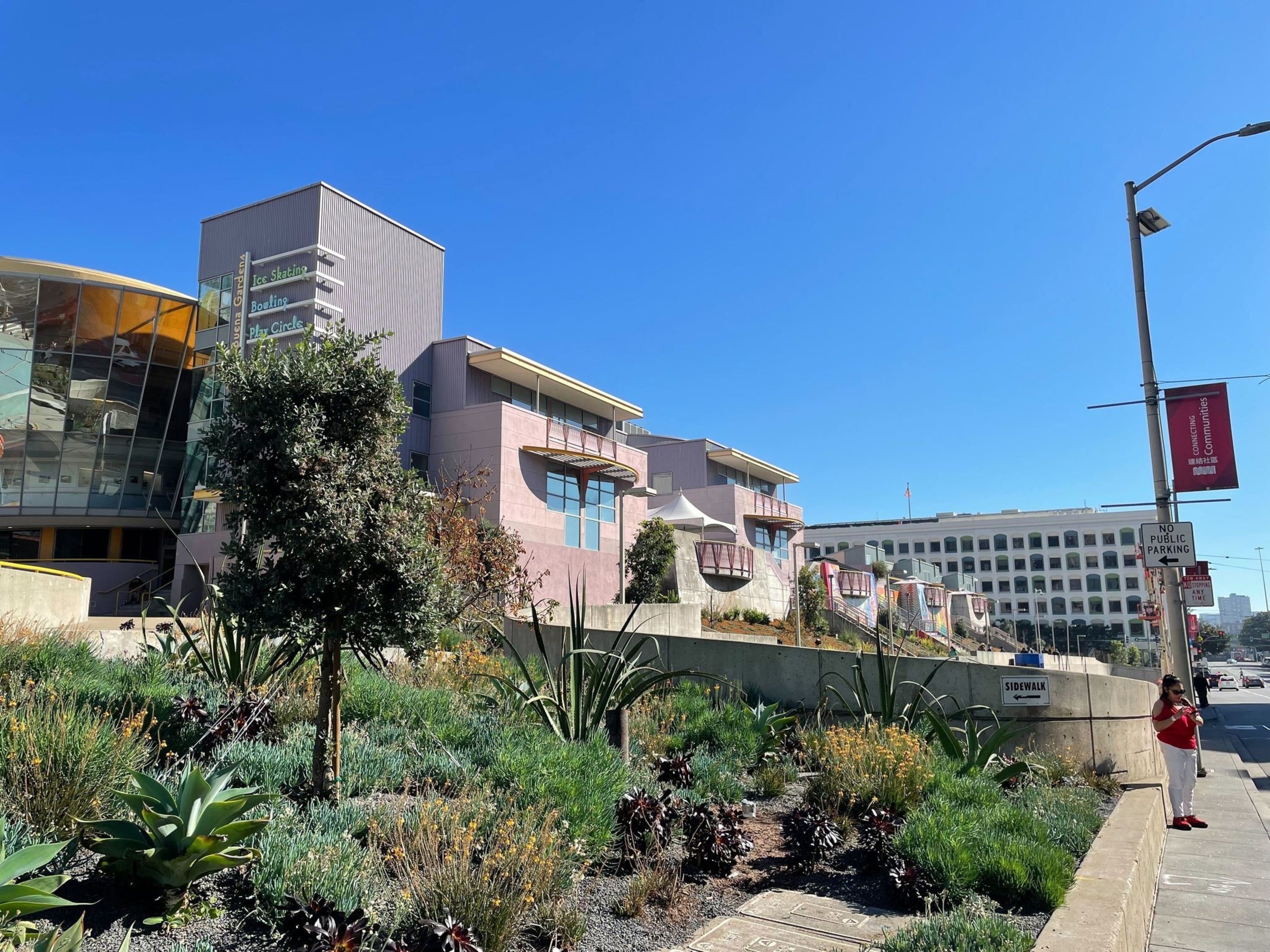 Looking north towards the Fourth Street walkway near the Yerba Buena Gardens, thousands of drought-tolerant plants and two murals measuring 55 feet across decorate the area near San Francisco's Moscone Center on Friday, Nov. 3, 2023. The plants and murals