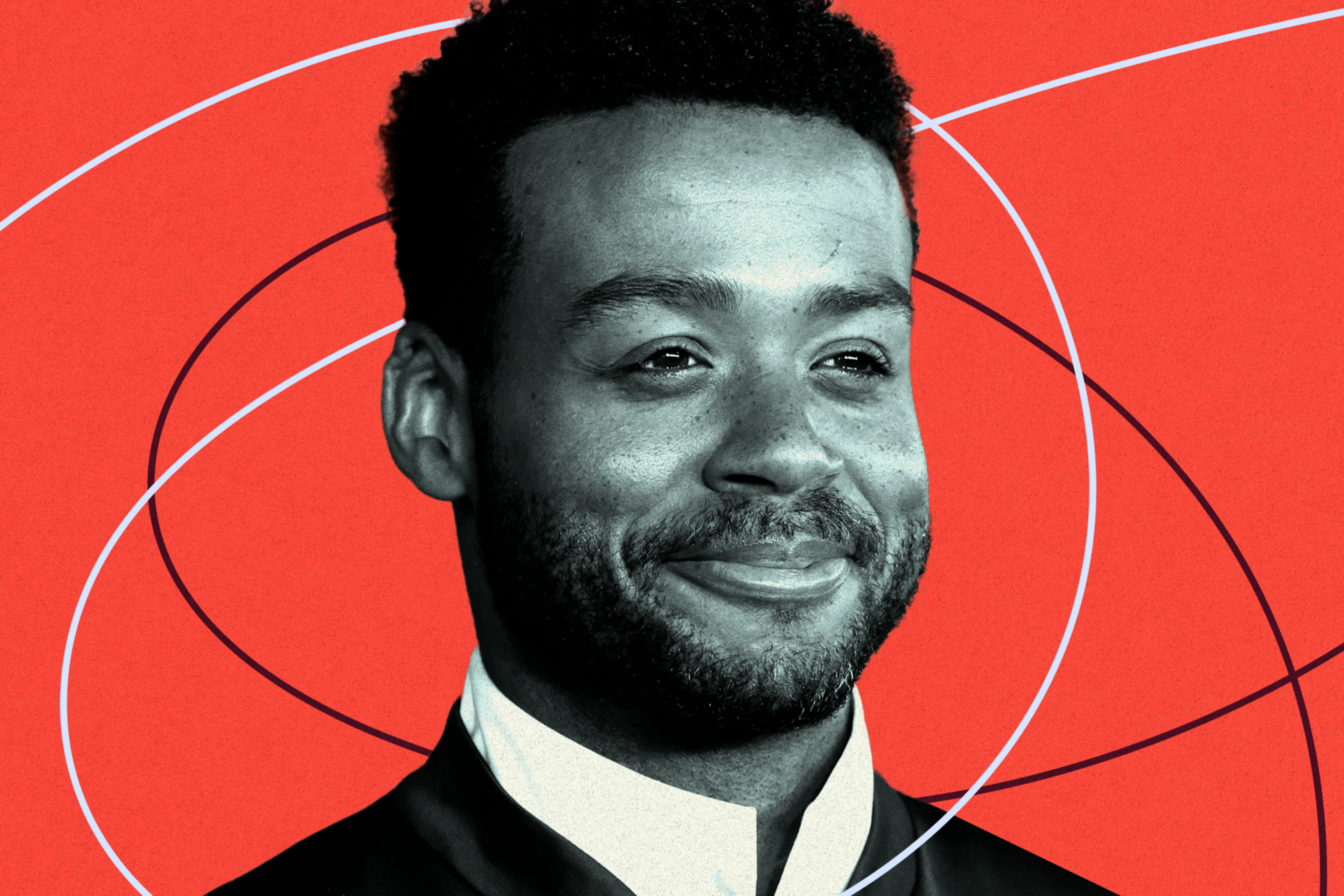 A man with short curly hair and a beard smiles softly against a red background with abstract white and black swirling lines.