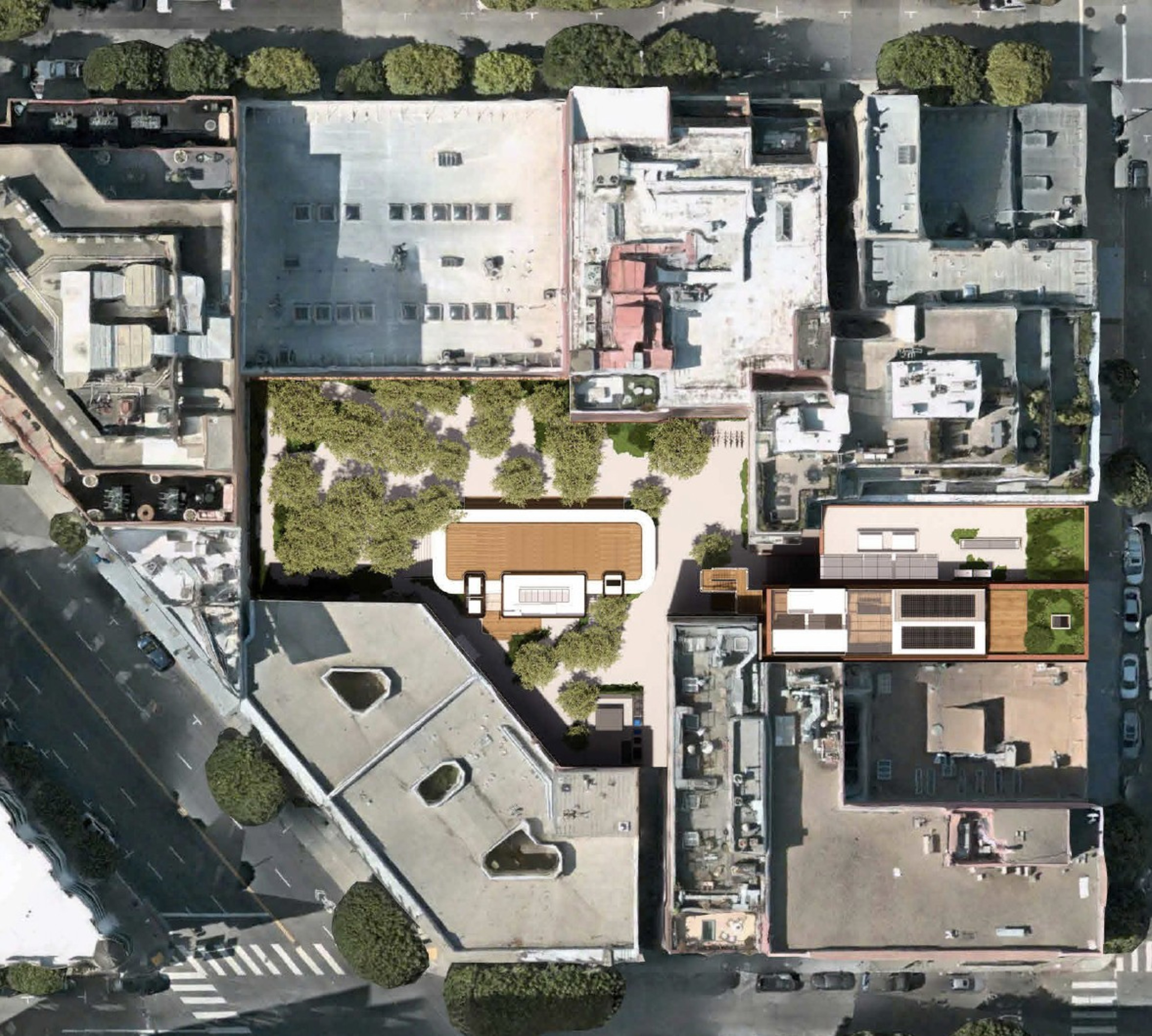 Aerial view of urban blocks with buildings, trees, and streets.