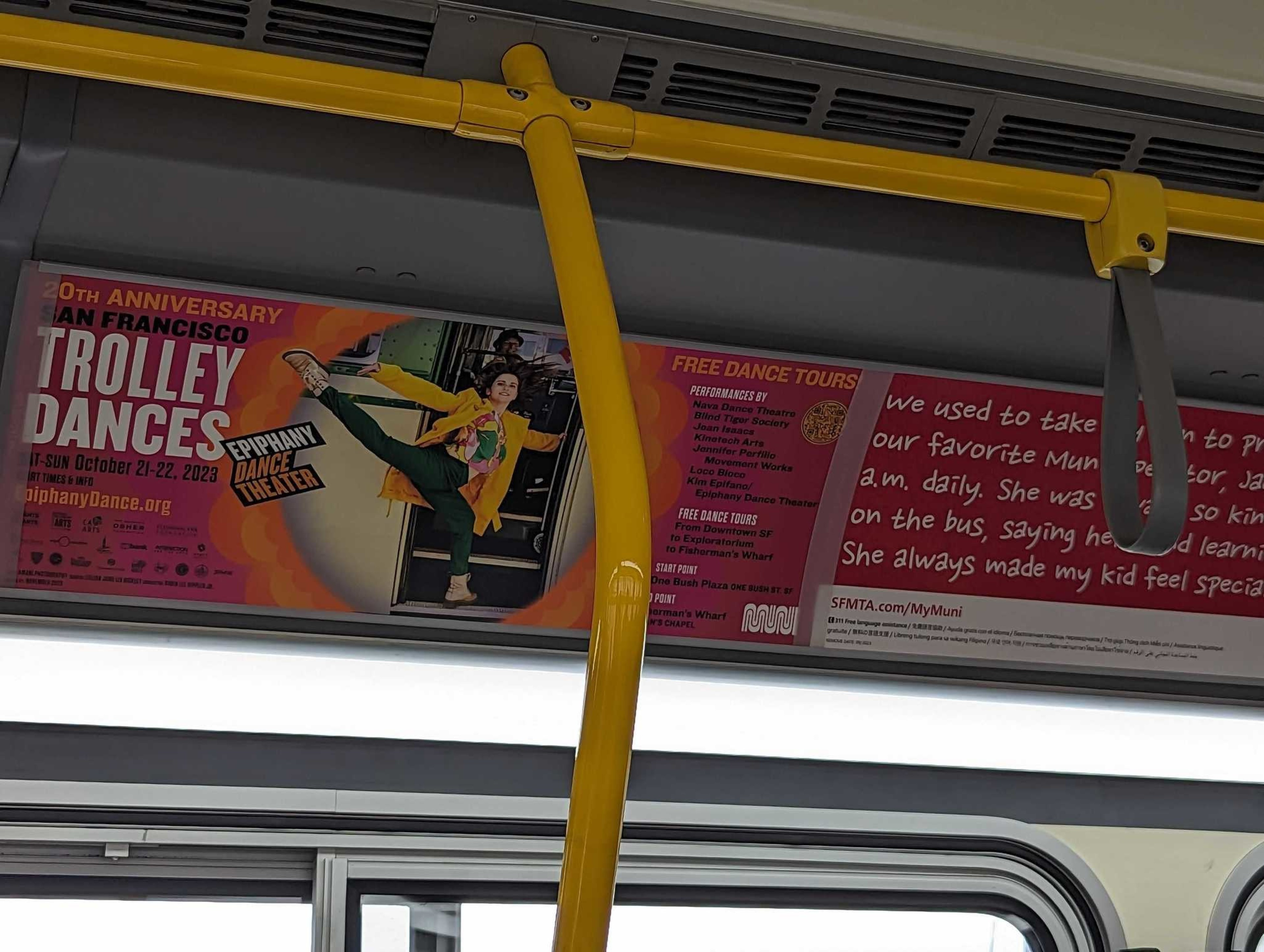 Aboard a Muni bus Sunday, an advertisement alerts riders to the San Francisco Trolley Dances festival on Sunday, October 22, 2023. Epiphany’s San Francisco Trolley Dances (SFTD) is an annual festival presented over 3 days along a designated public transit route. SFTD connects neighborhoods and participants to San Francisco’s history, culture, architecture, natural environment and social fabric.