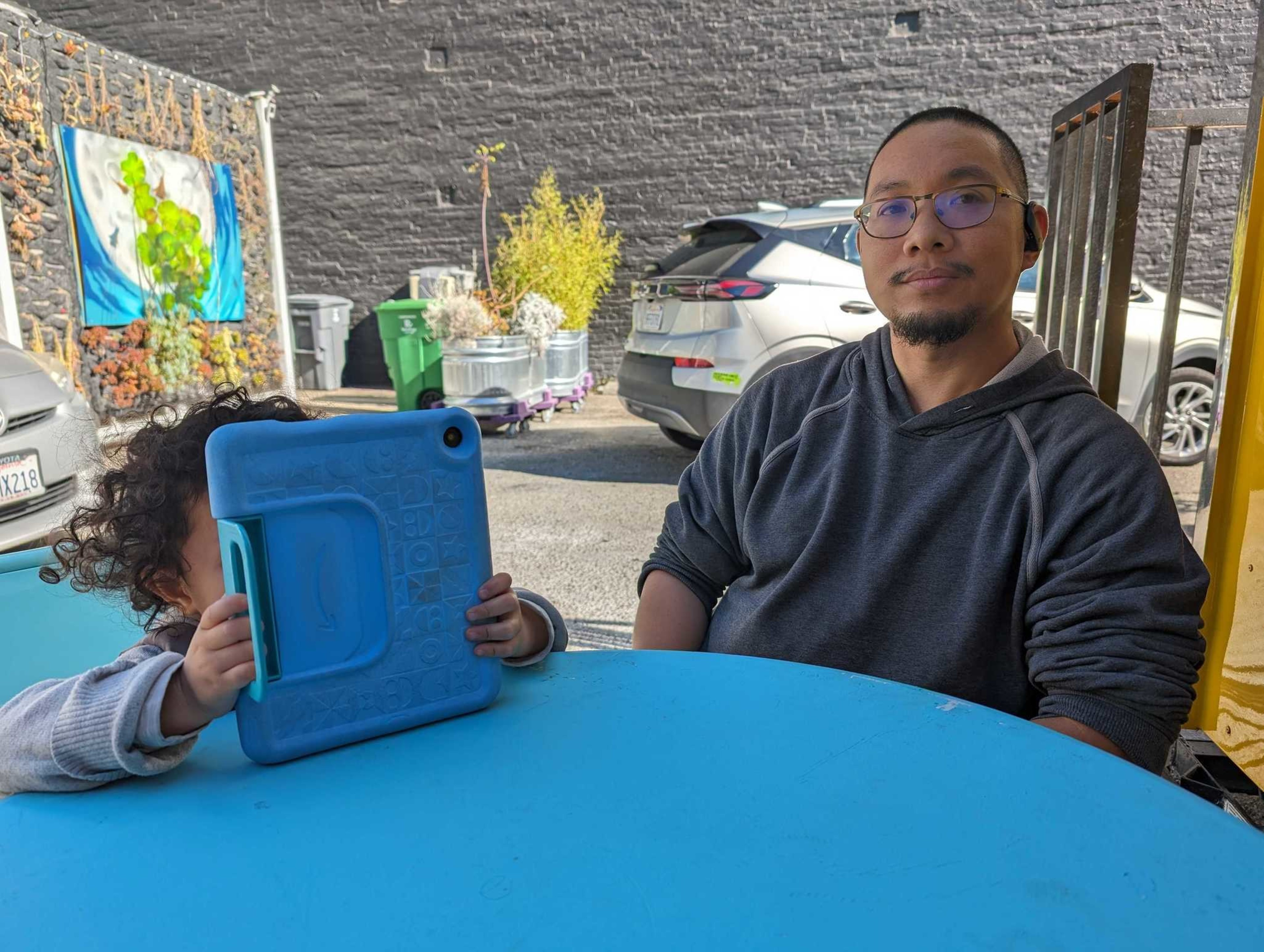 San Francisco resident and parent David Delena says a day car center for his son Caeden, 3, will temporarily close for several days during the upcoming APEC conference.