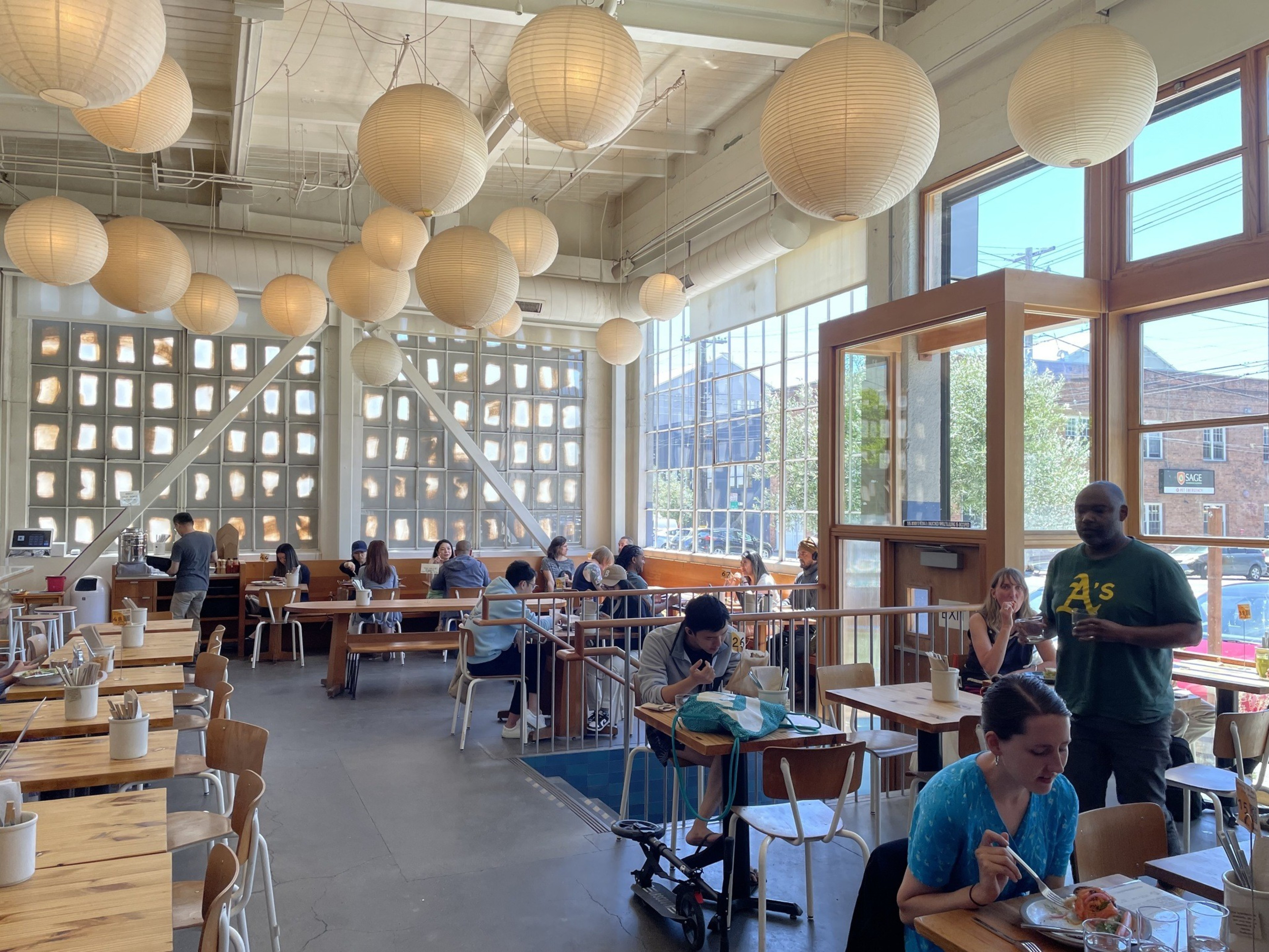 People eat inside a restaurant.