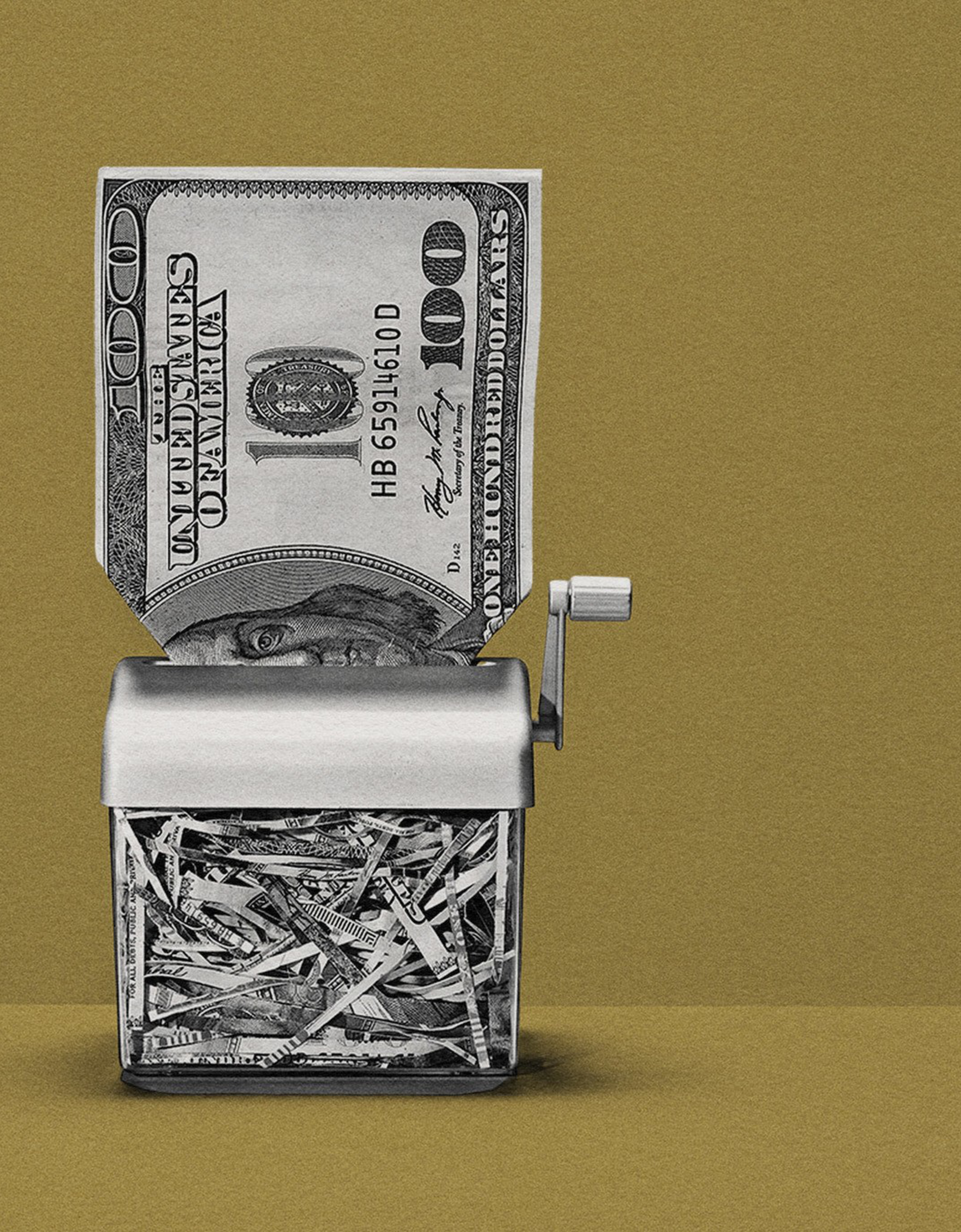 A one hundred dollar bill getting shredded