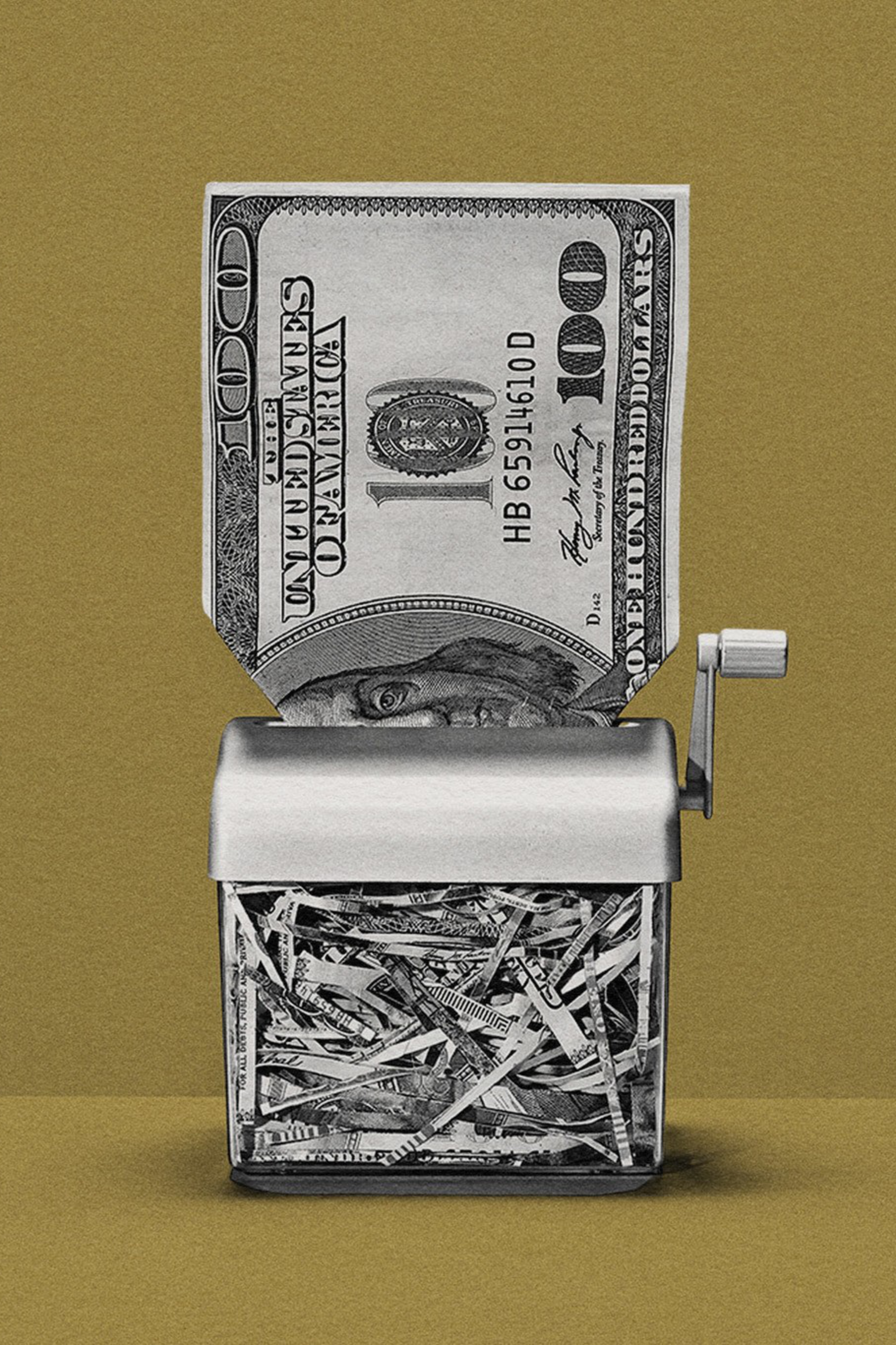 A one hundred dollar bill getting shredded
