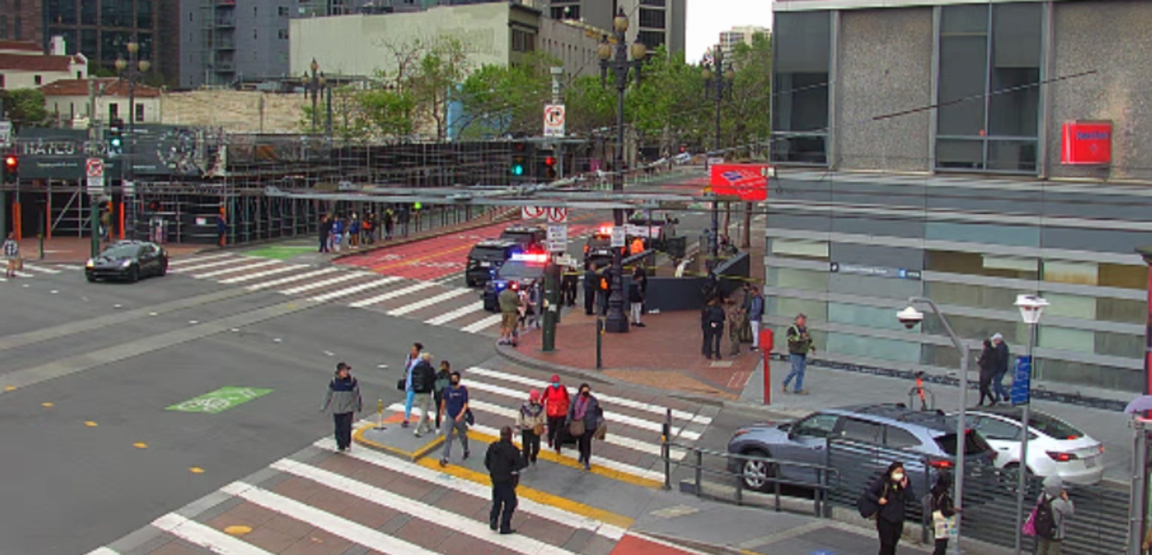 San Francisco police and fire vehicles respond to a shooting near the Van Ness Muni station on Friday. | SFMTA