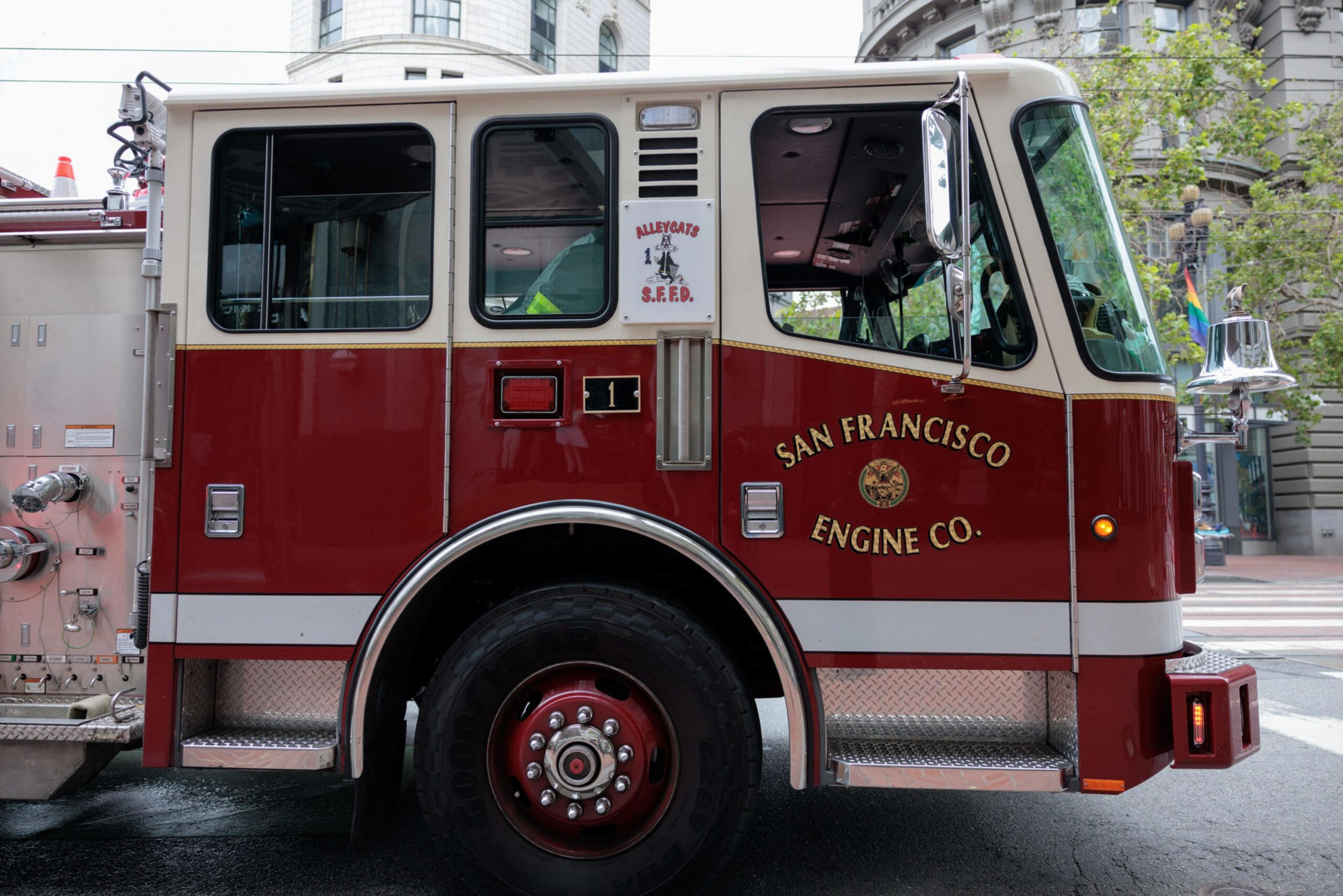 San Francisco firefighters rescued two people Wednesday afternoon after a car lost control on a street near Glen Canyon Park.