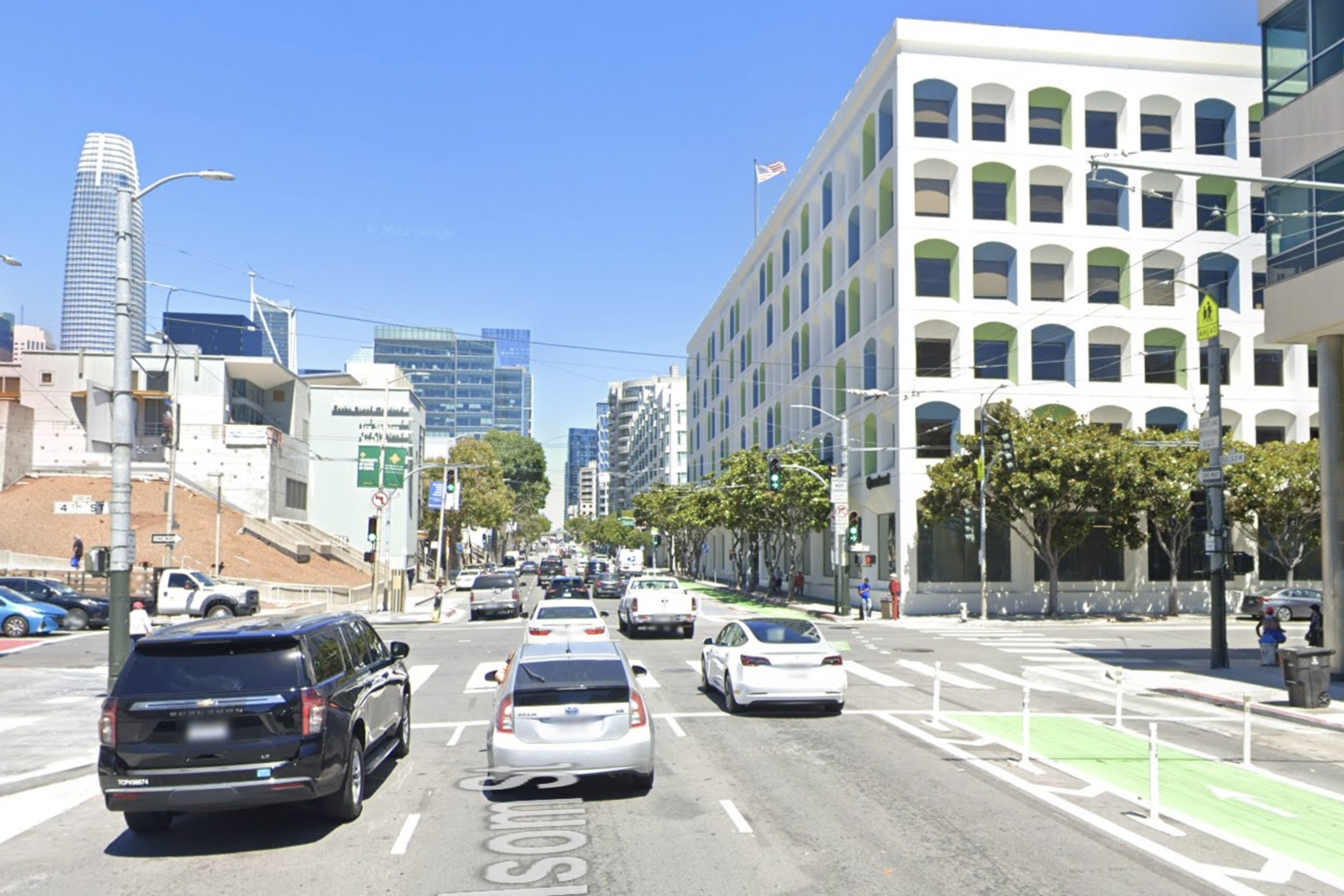 Cars drive along Folsom at 4th St. in San Francisco
