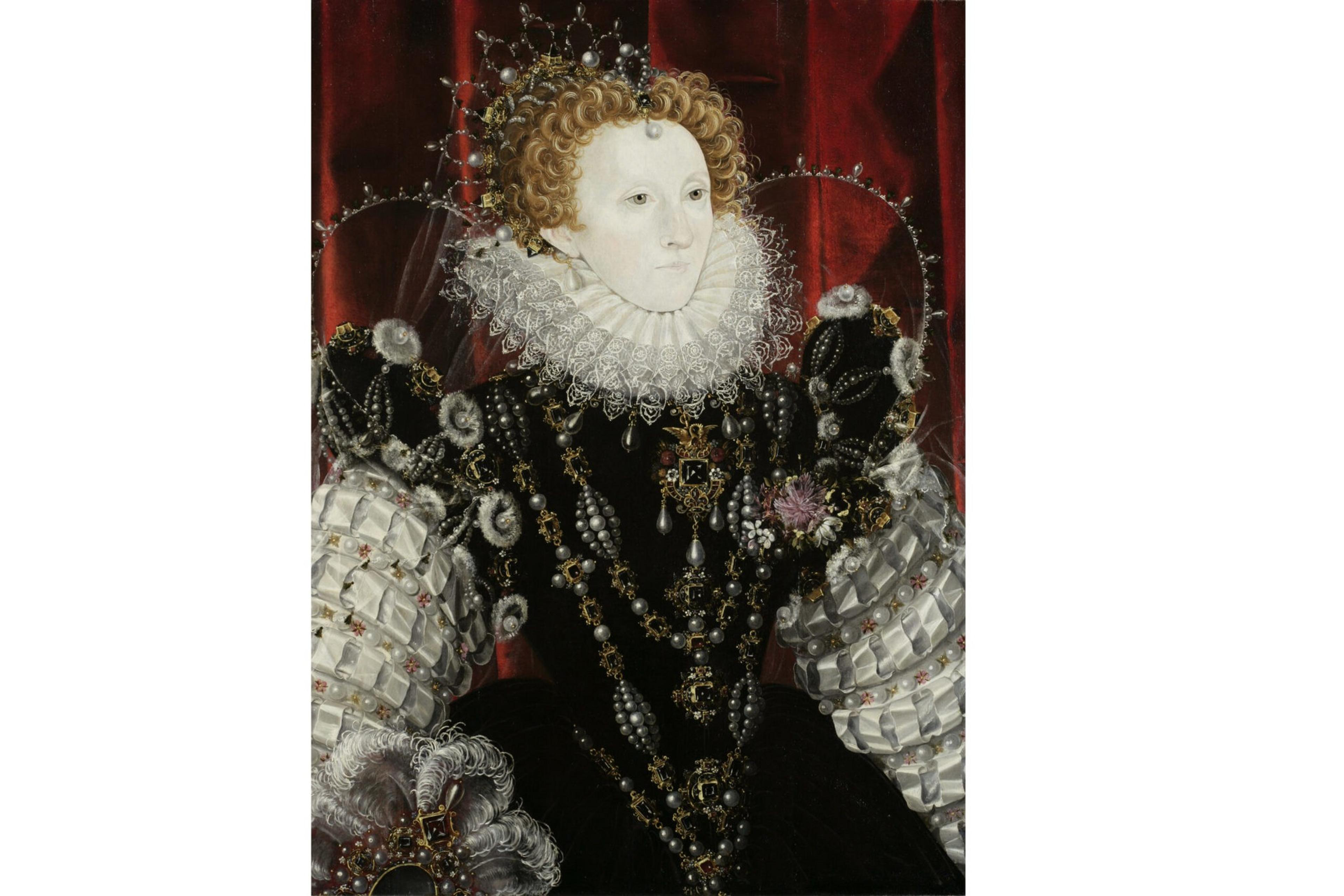 A regal woman with pale skin and curly red hair wears an elaborate black dress adorned with pearls and jewels, a white lace ruff, and a crown.