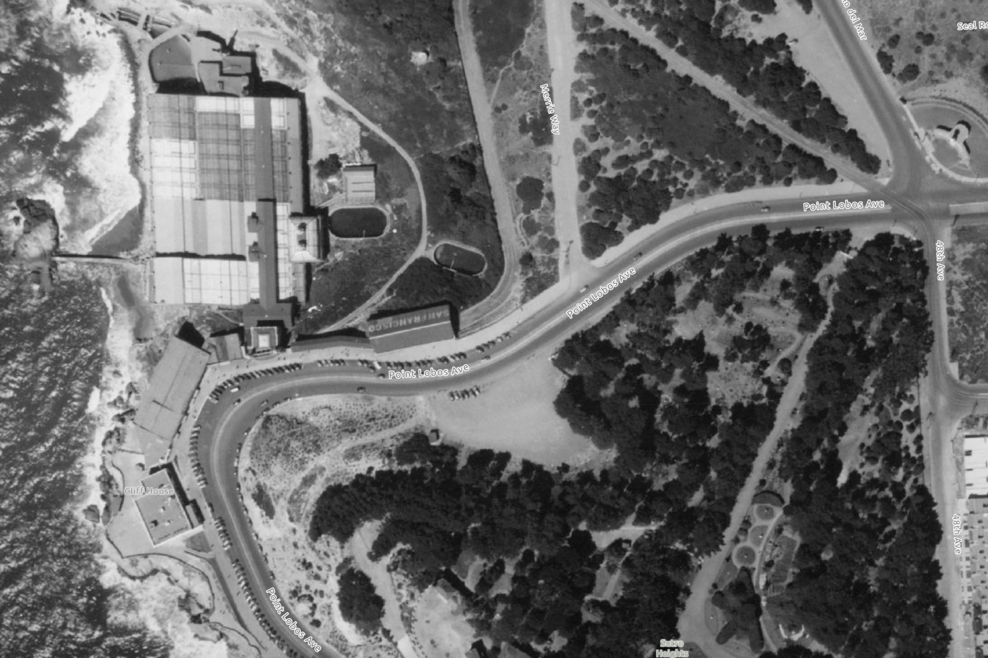 An aerial view of Sutro Baths, the Cliff House and Point Lobos Ave. just north of Ocean Beach in San Francisco in 1938.