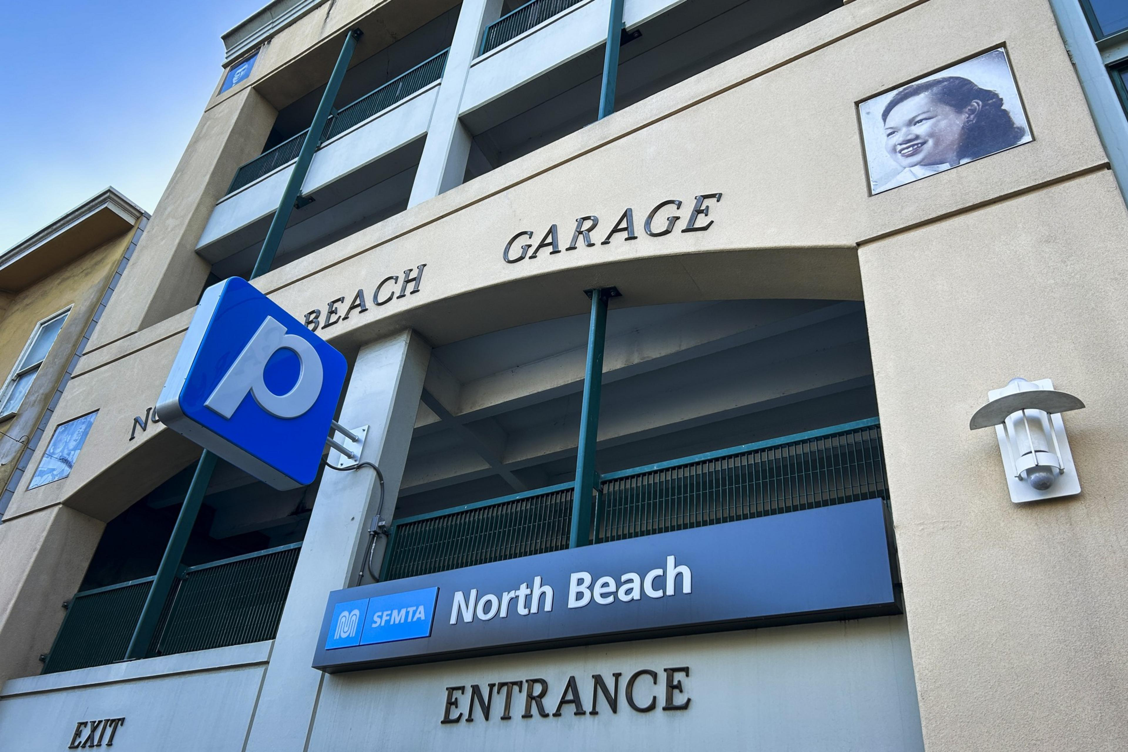 the exterior of a parking garage shot from below