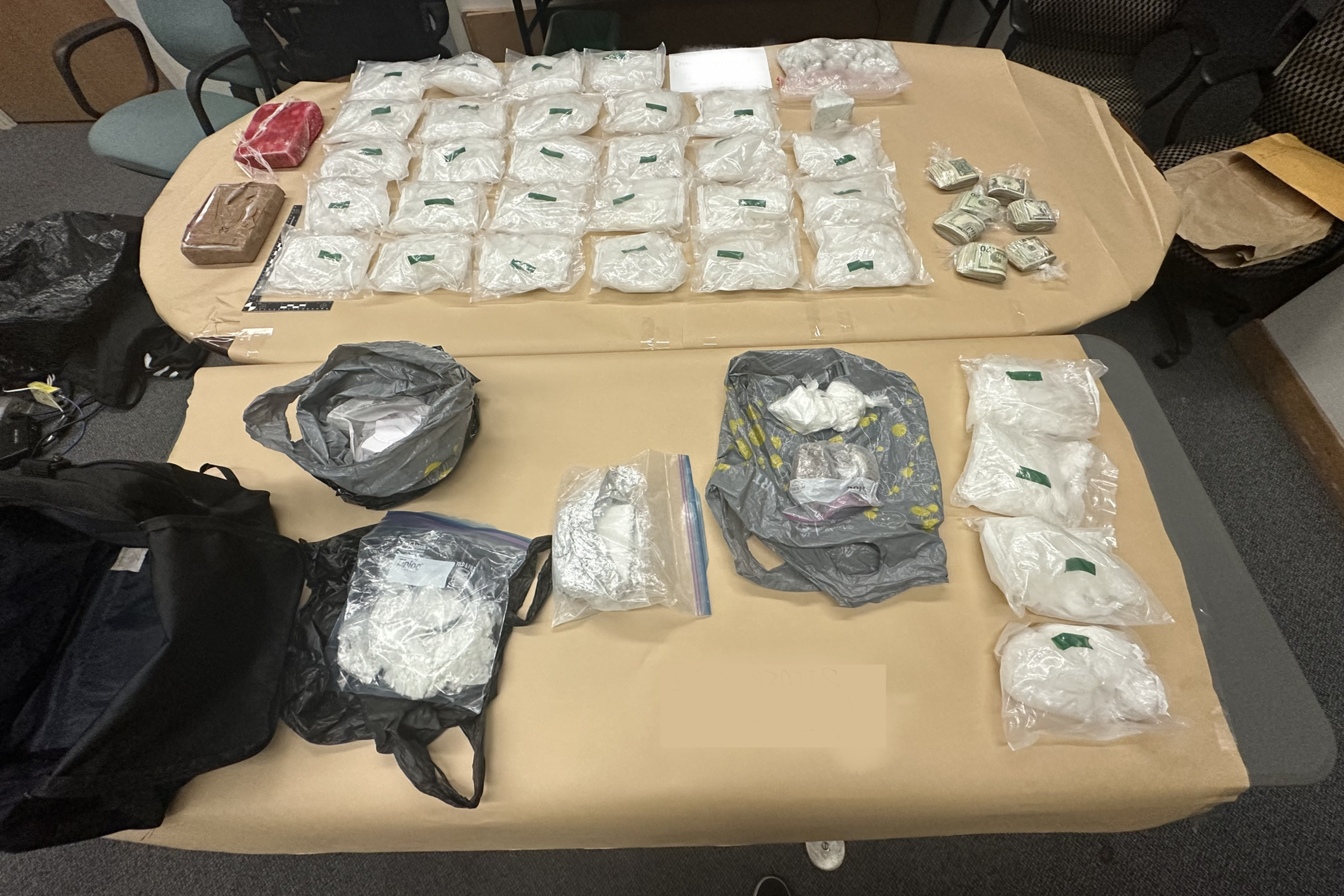 Bags of white substances laid out on a table