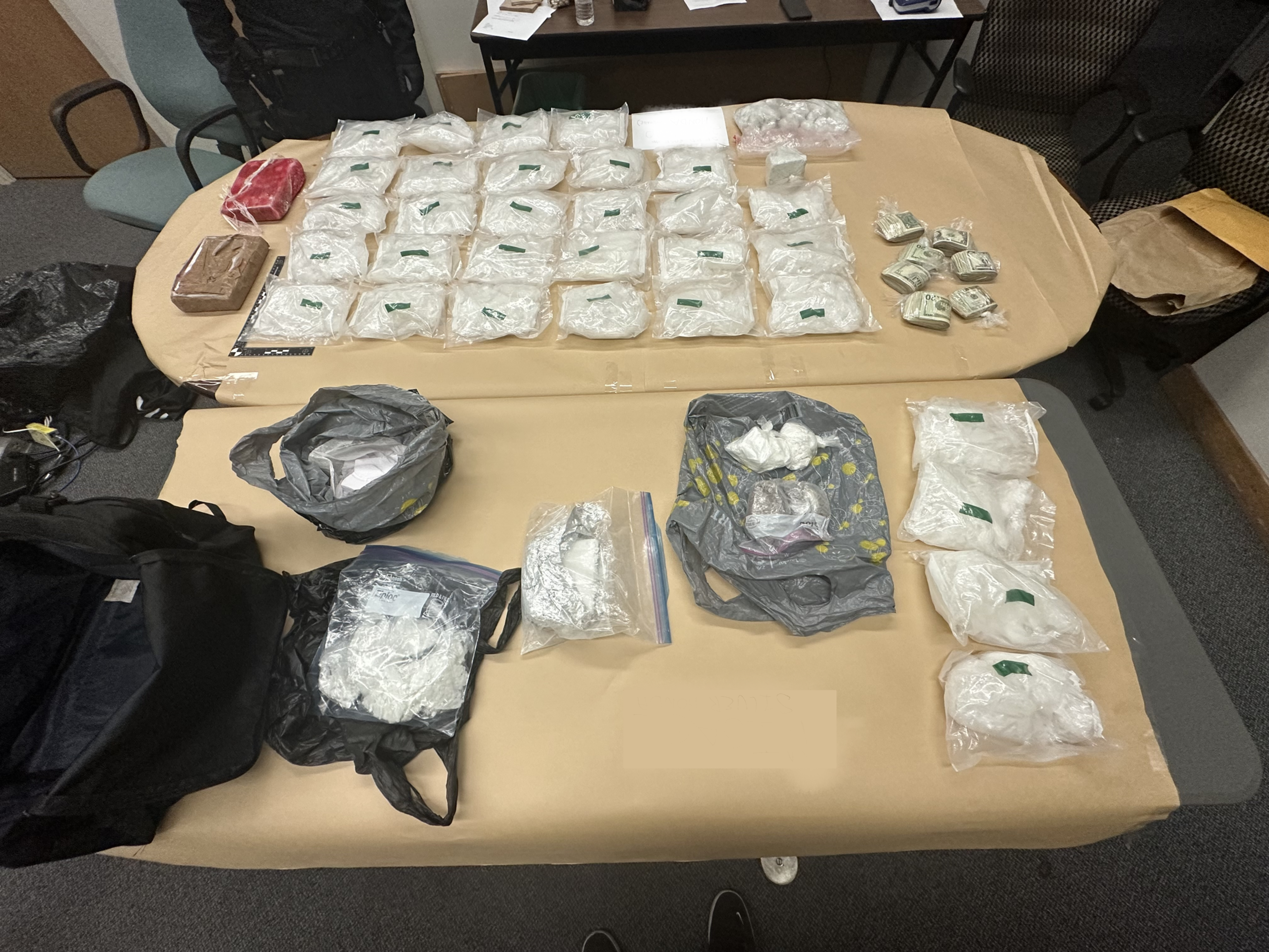 Bags of white substances laid out on a table