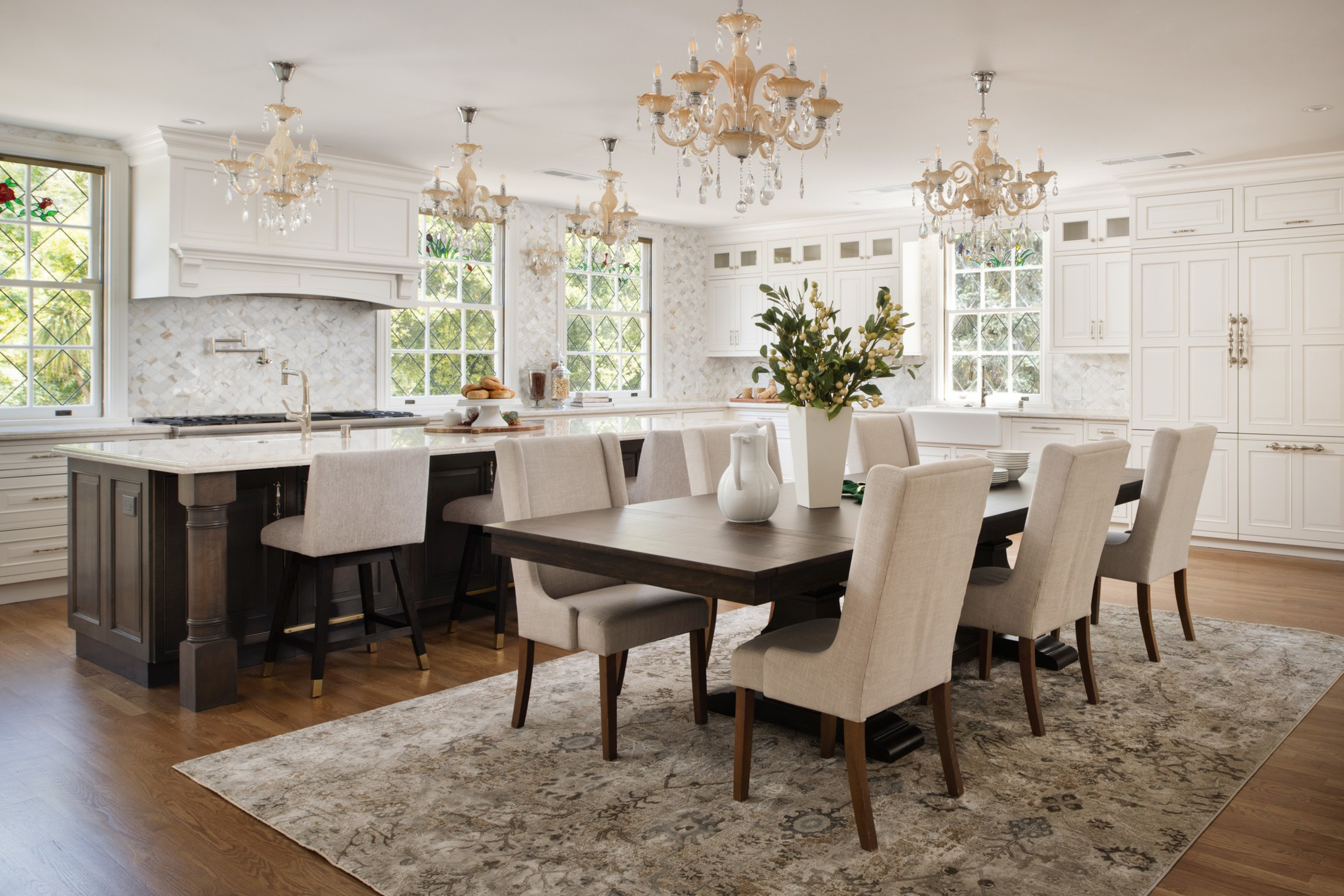Fancy chandeliers, deep cabinets and a marble-topped island adorn a kitchen within the 'Western White House'