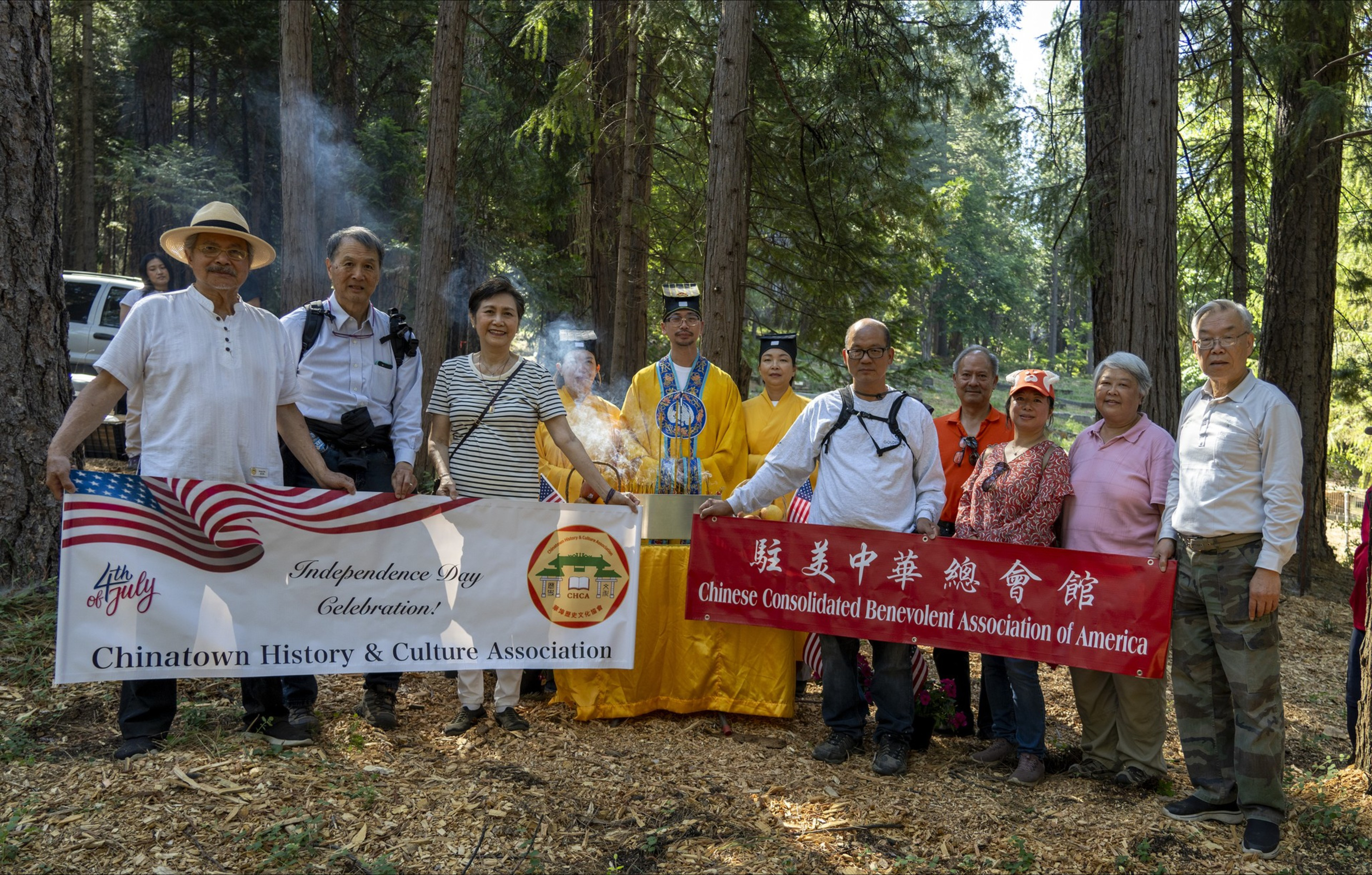 A group of people stand for a portrait.