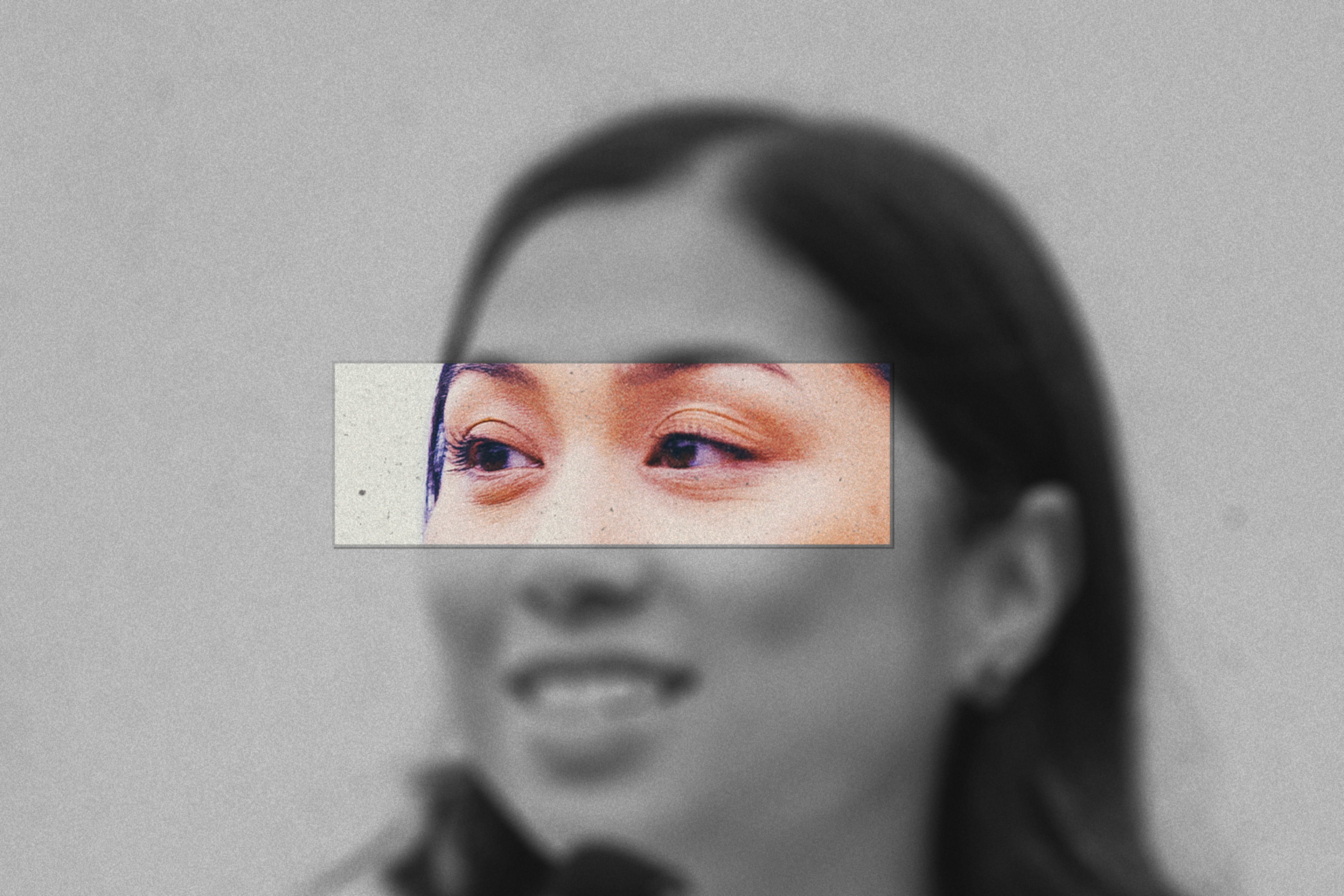 A black-and-white portrait of a smiling woman with long hair includes a color close-up of her eyes framed in a small rectangle over her face.