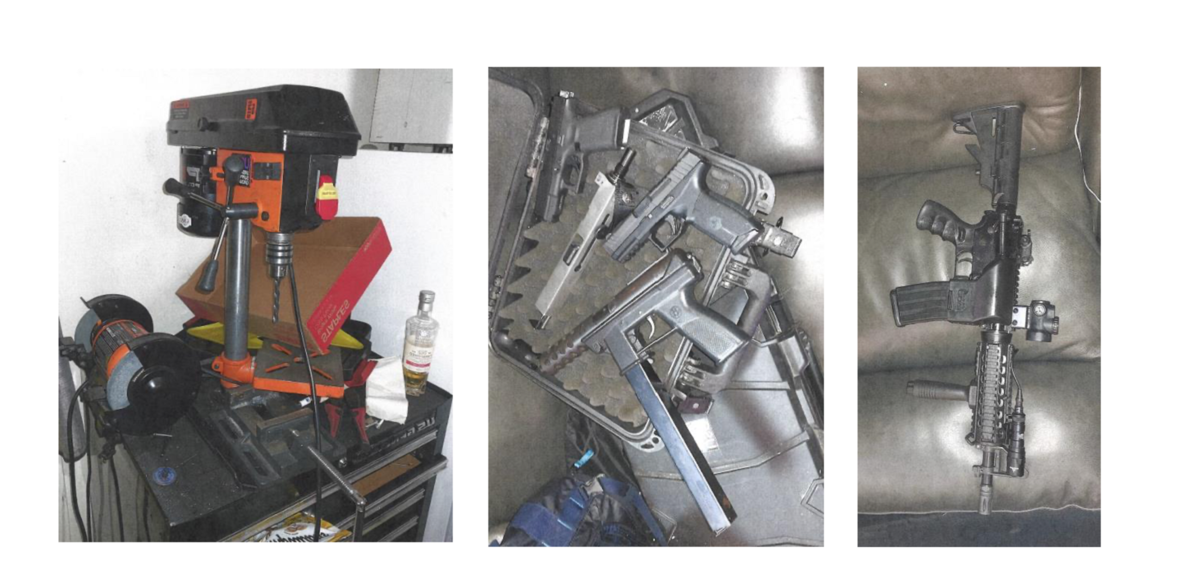 A group of guns lay on a couch.