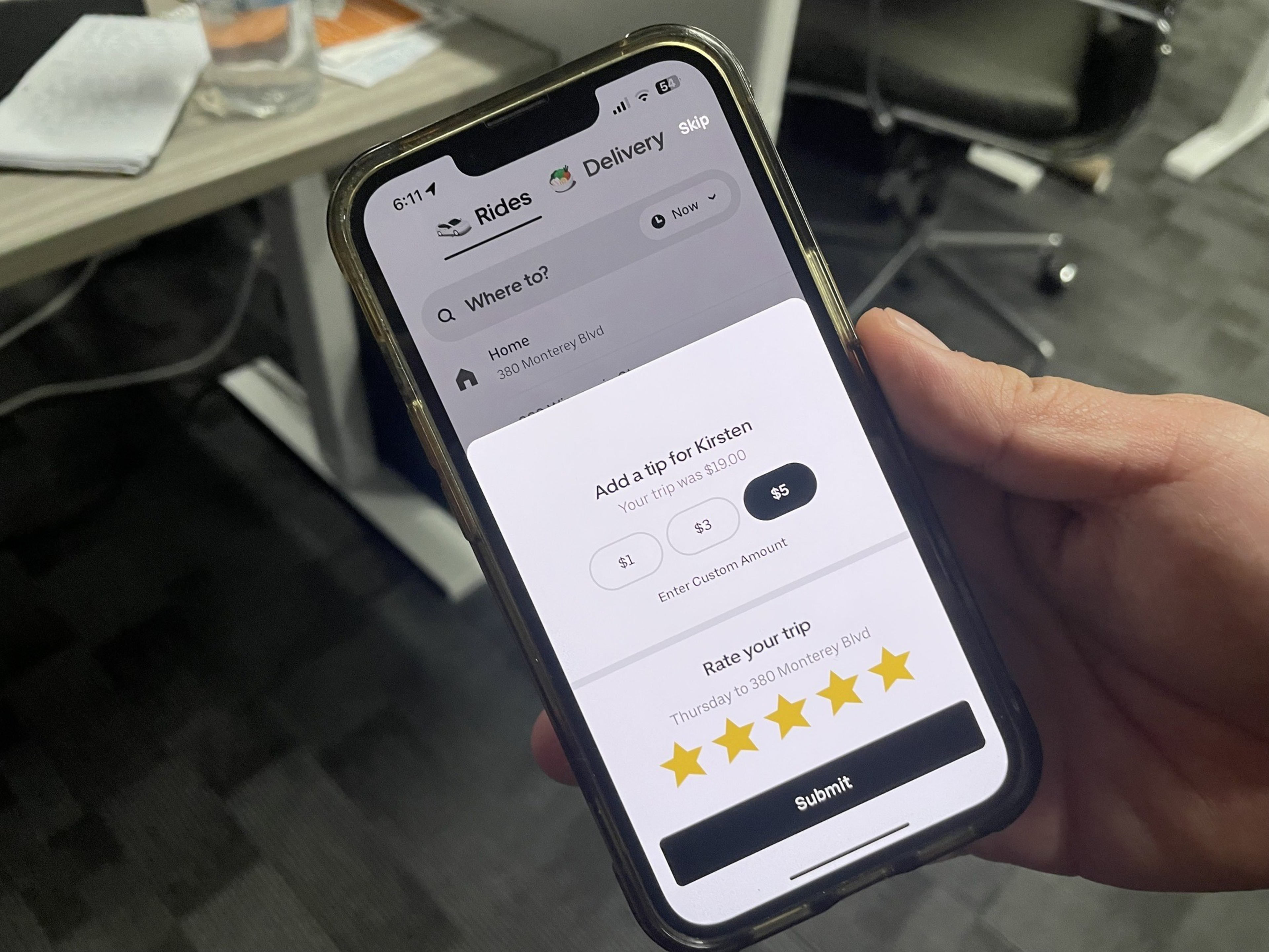 A payment screen is seen on a mobile phone.