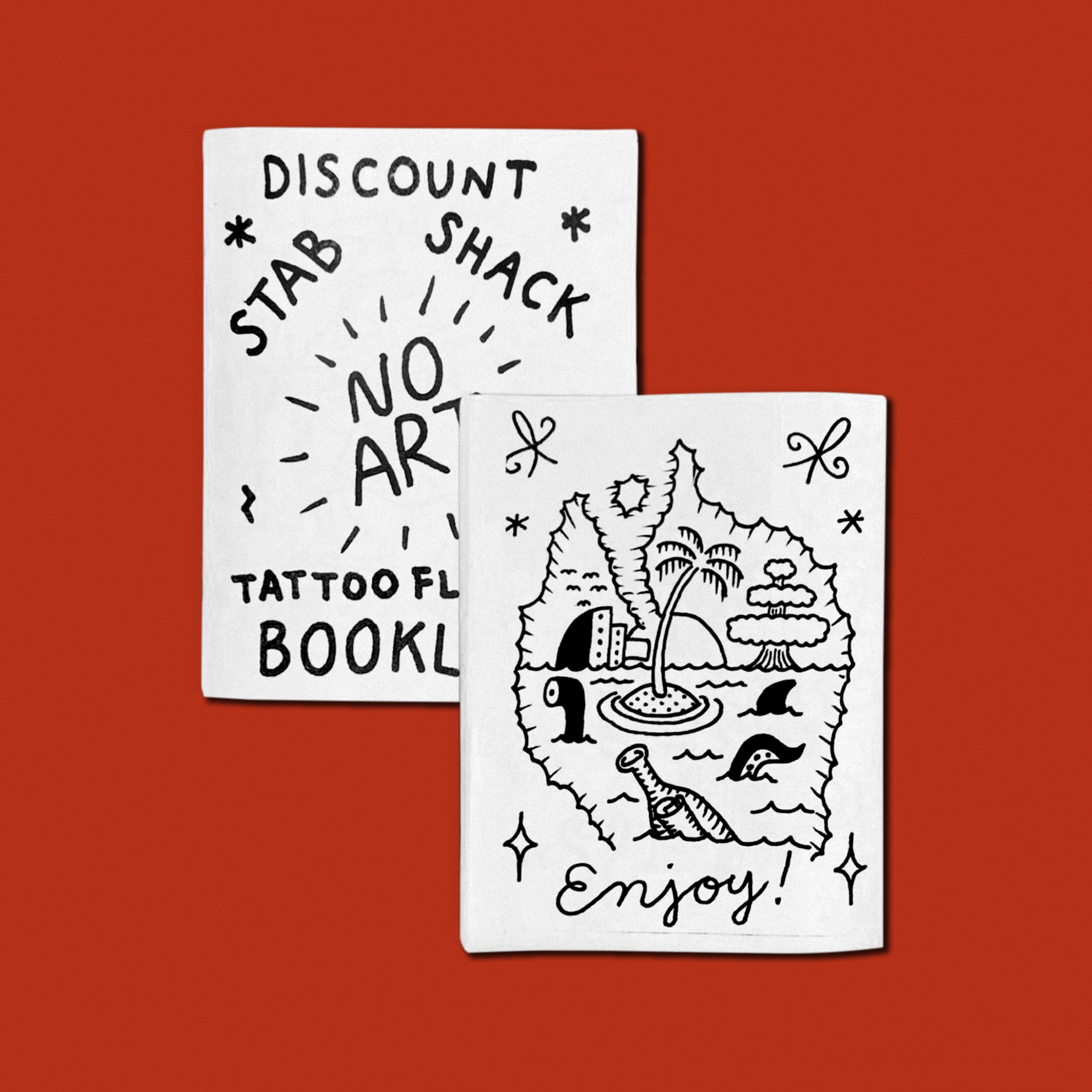 Two booklets are shown on a red background. One reads &quot;Discount Stab Shack, No Art, Tattoo Flash Booklet.&quot; The other features a cartoon island scene and says &quot;Enjoy!&quot;