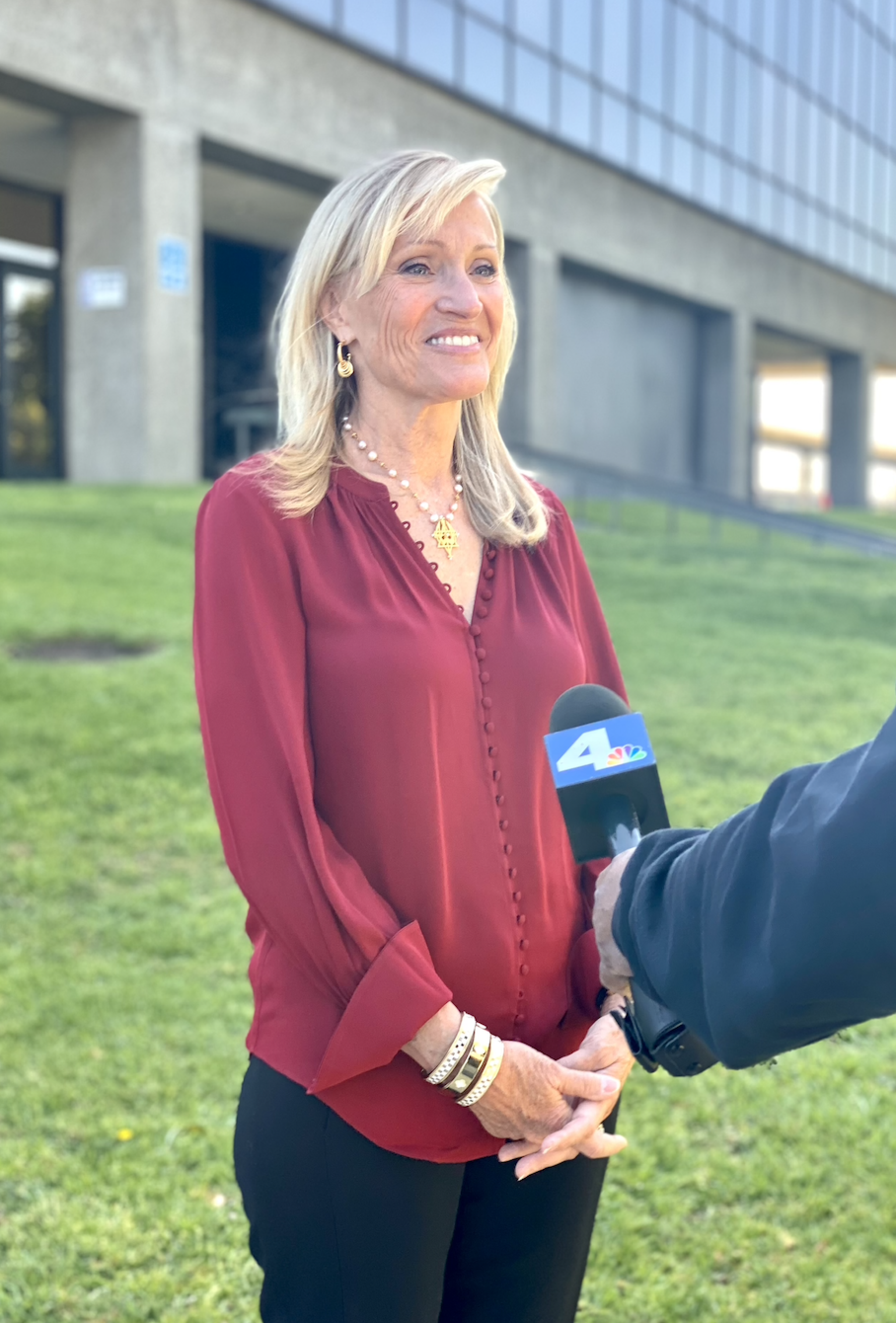 Anne Dunsmore gives a TV interview.