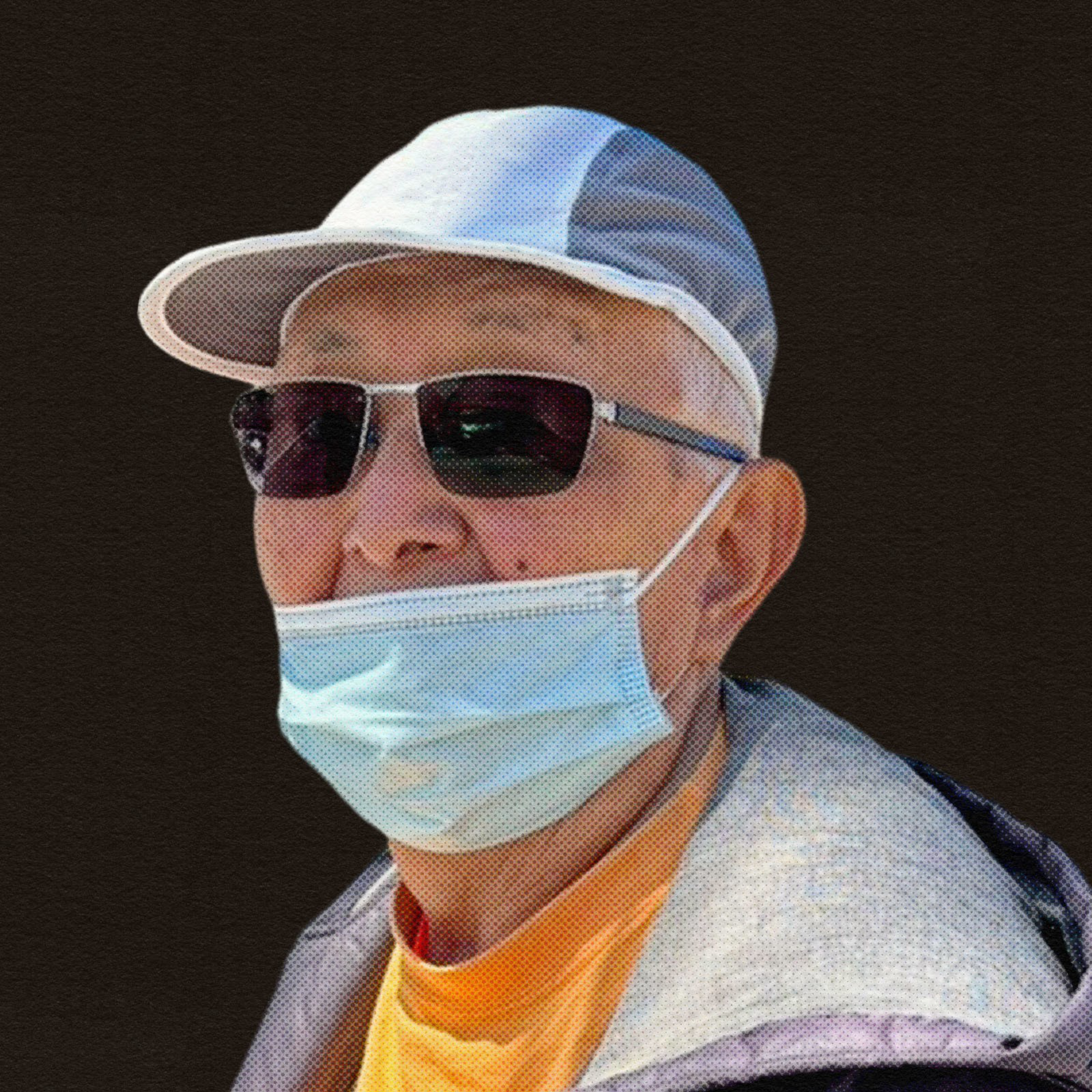 A portrait of a person with a mask on.