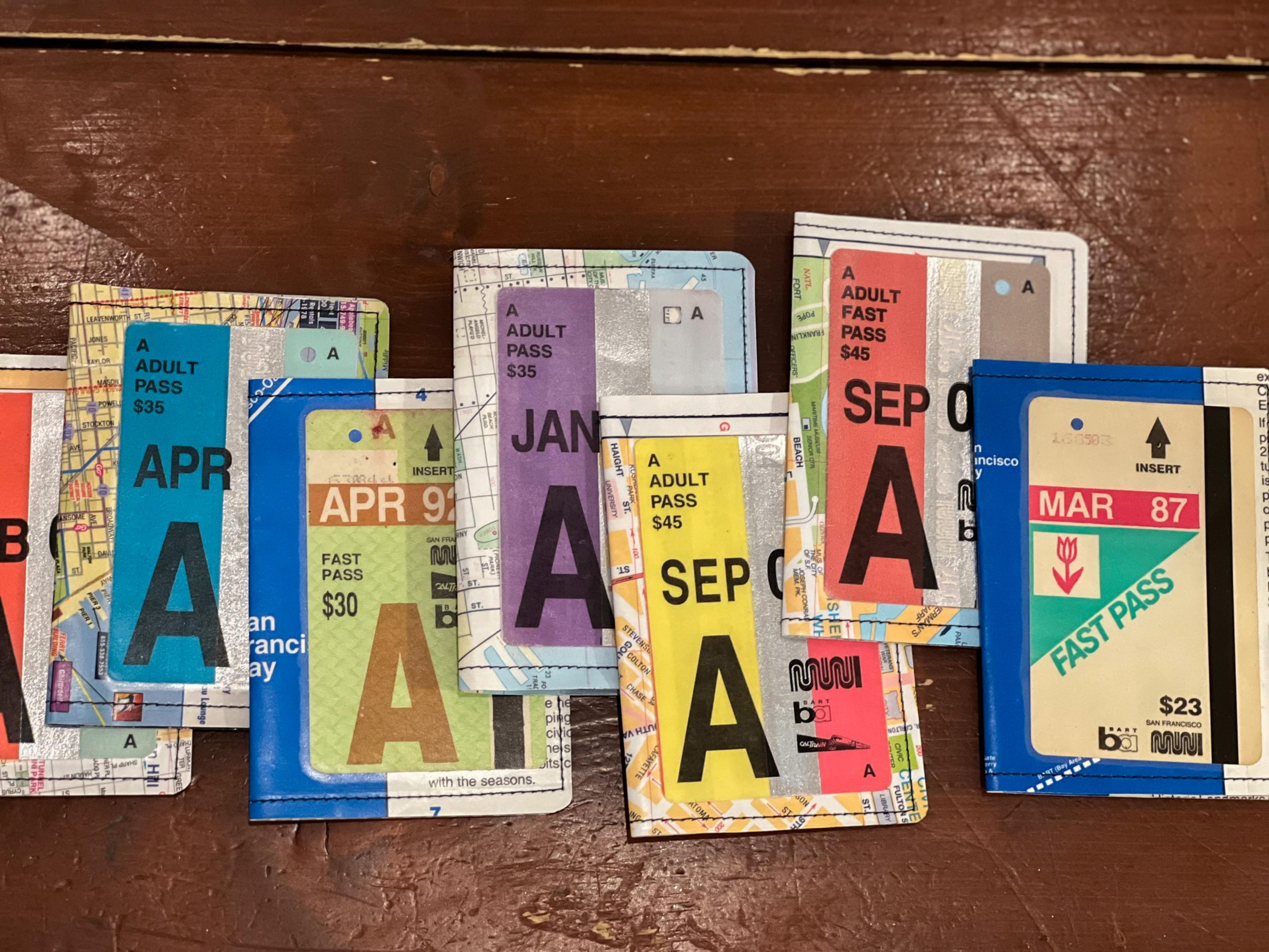 Pocket-sized maps made out of vintage Muni fast-passes are seen on the counter of Fleetwood clothing store