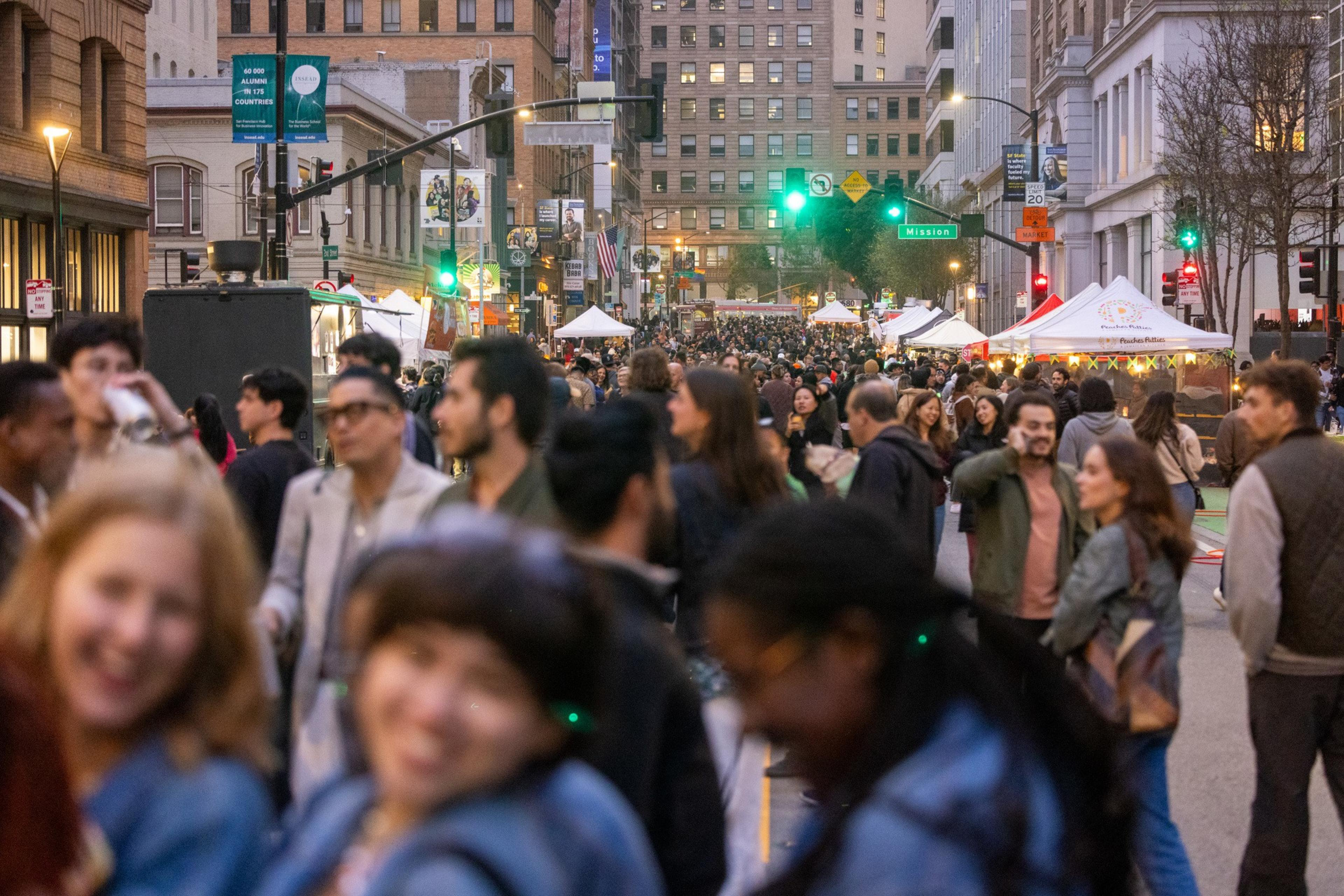 A big crowd on a street. 