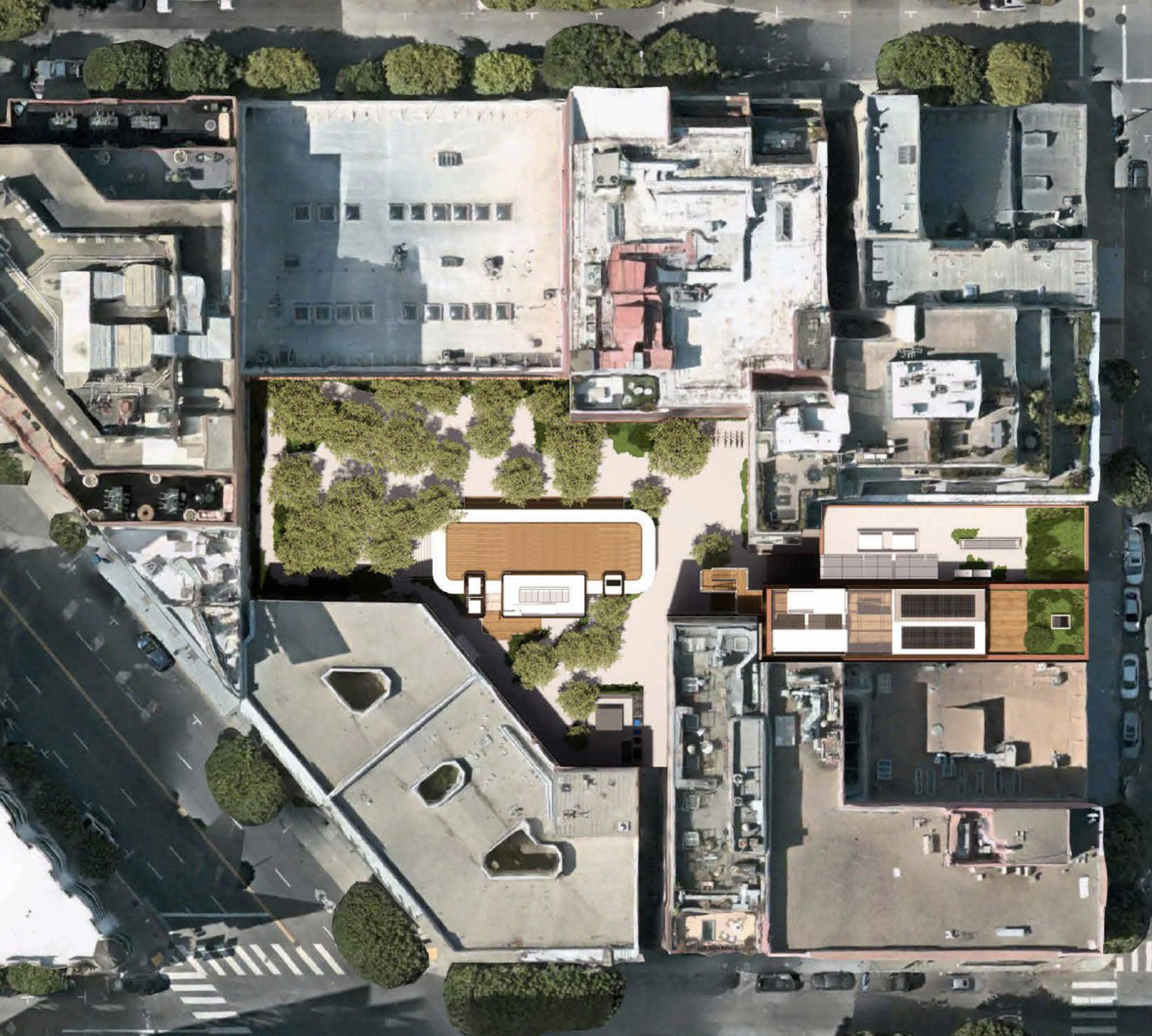 Aerial view of urban blocks with buildings, trees, and streets.