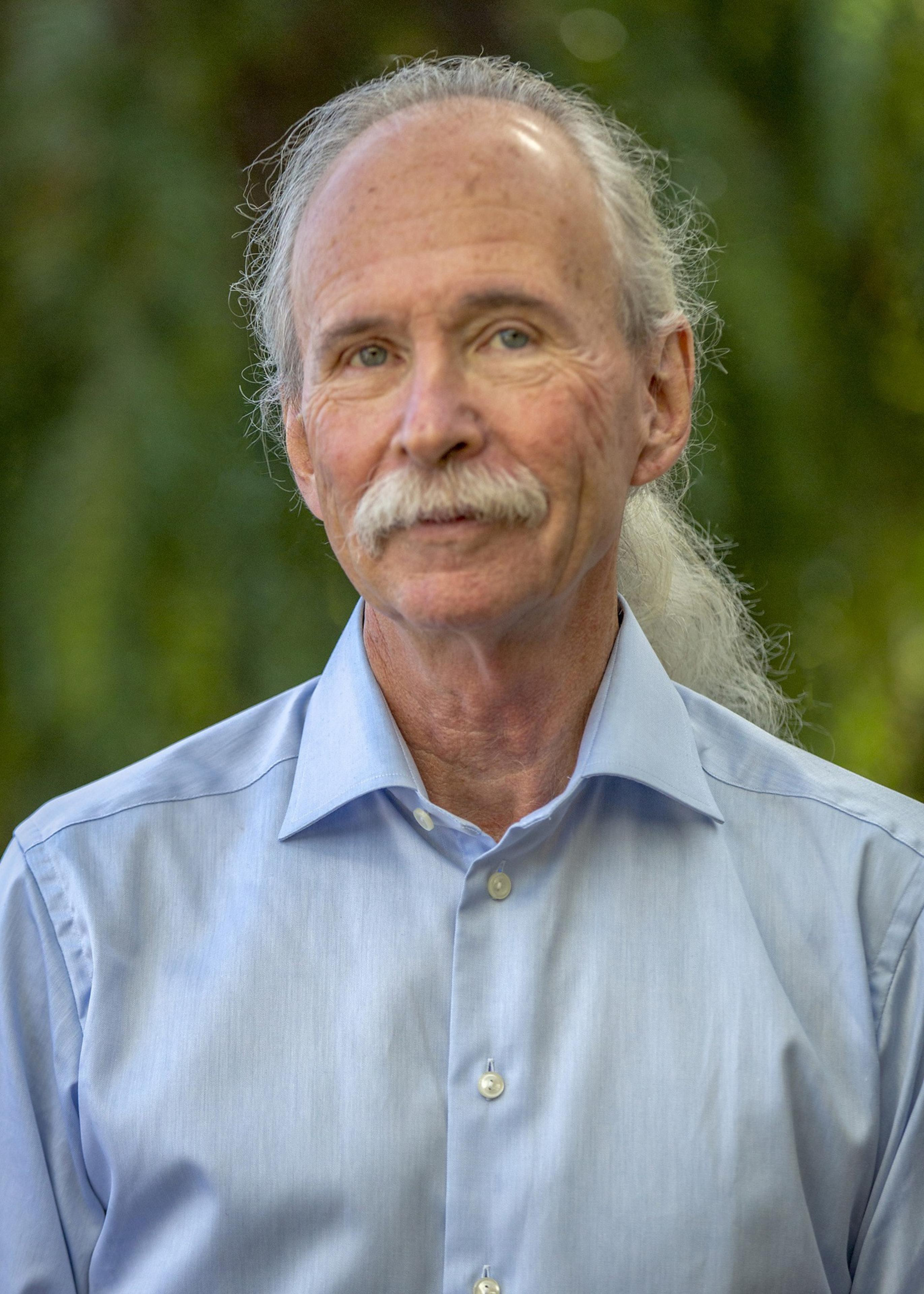 a picture of a man in a blue shirt
