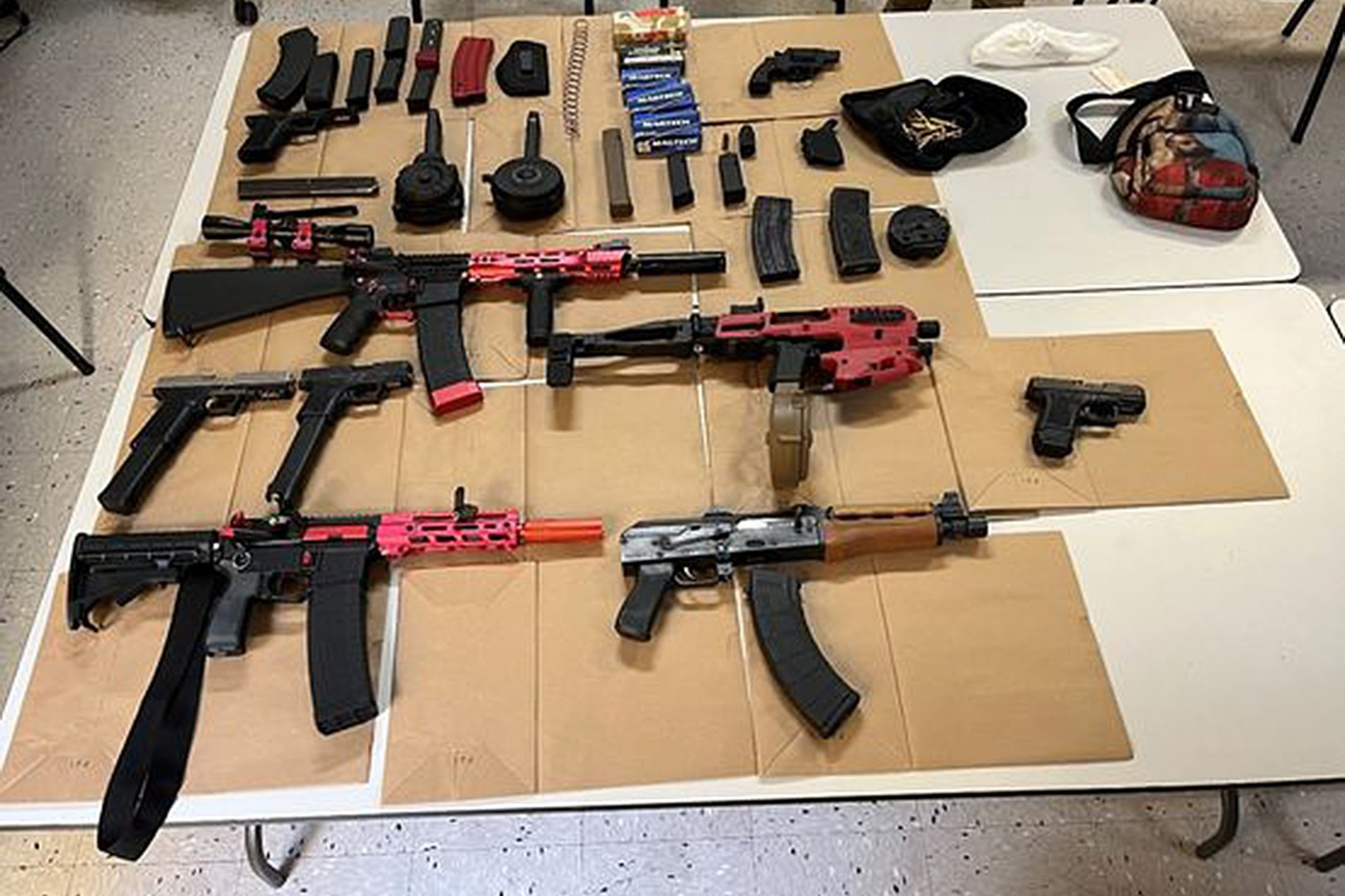 A group of ghost guns on a table.