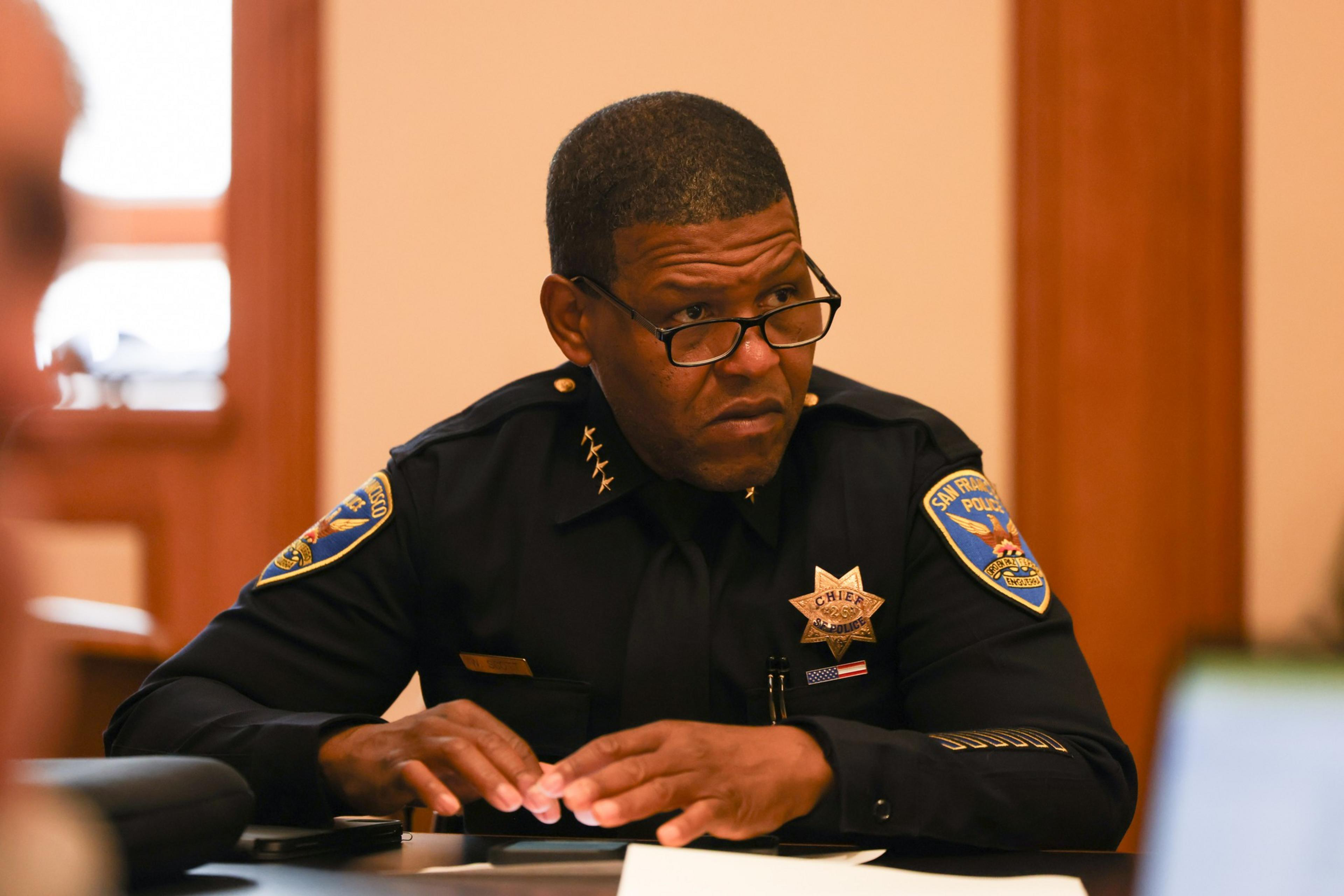 Police Chief Bill Scott sitting at a table.