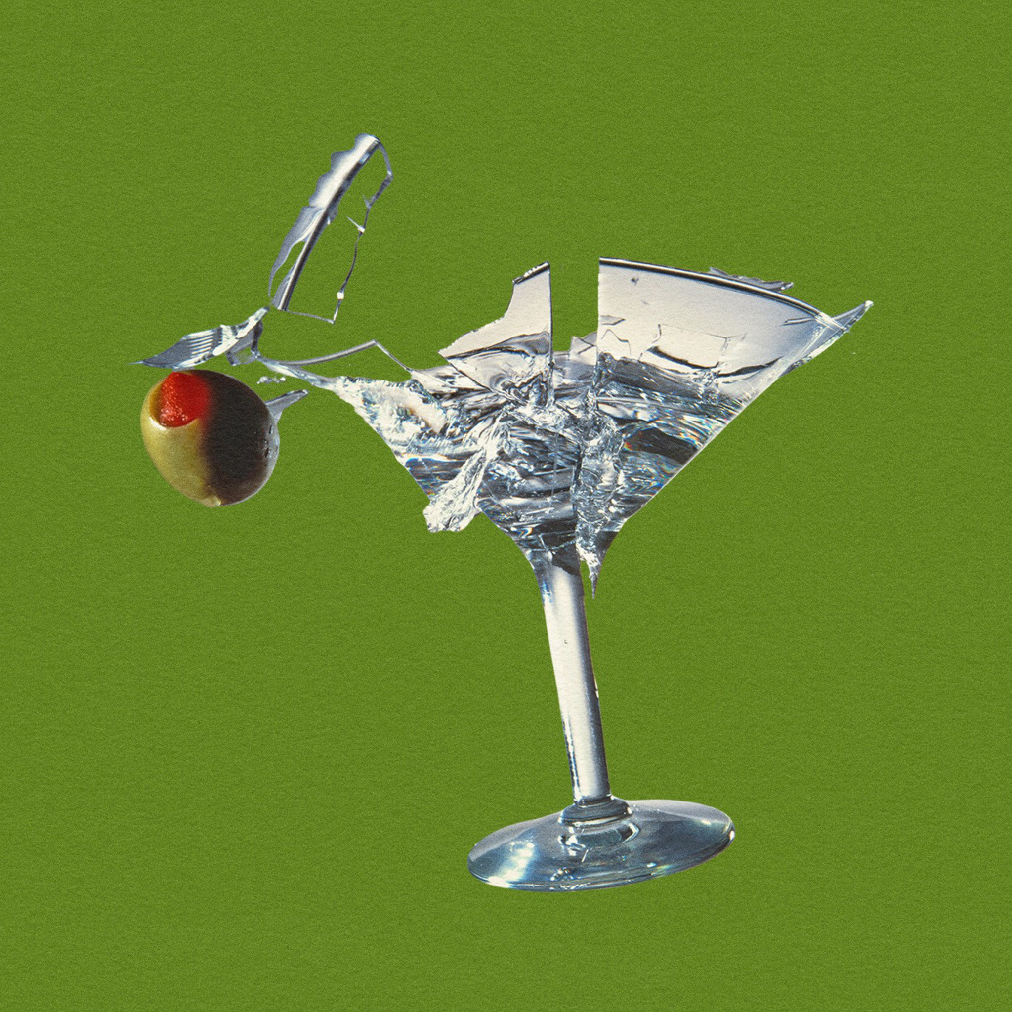 A photo illustration depicting a broken martini glass.