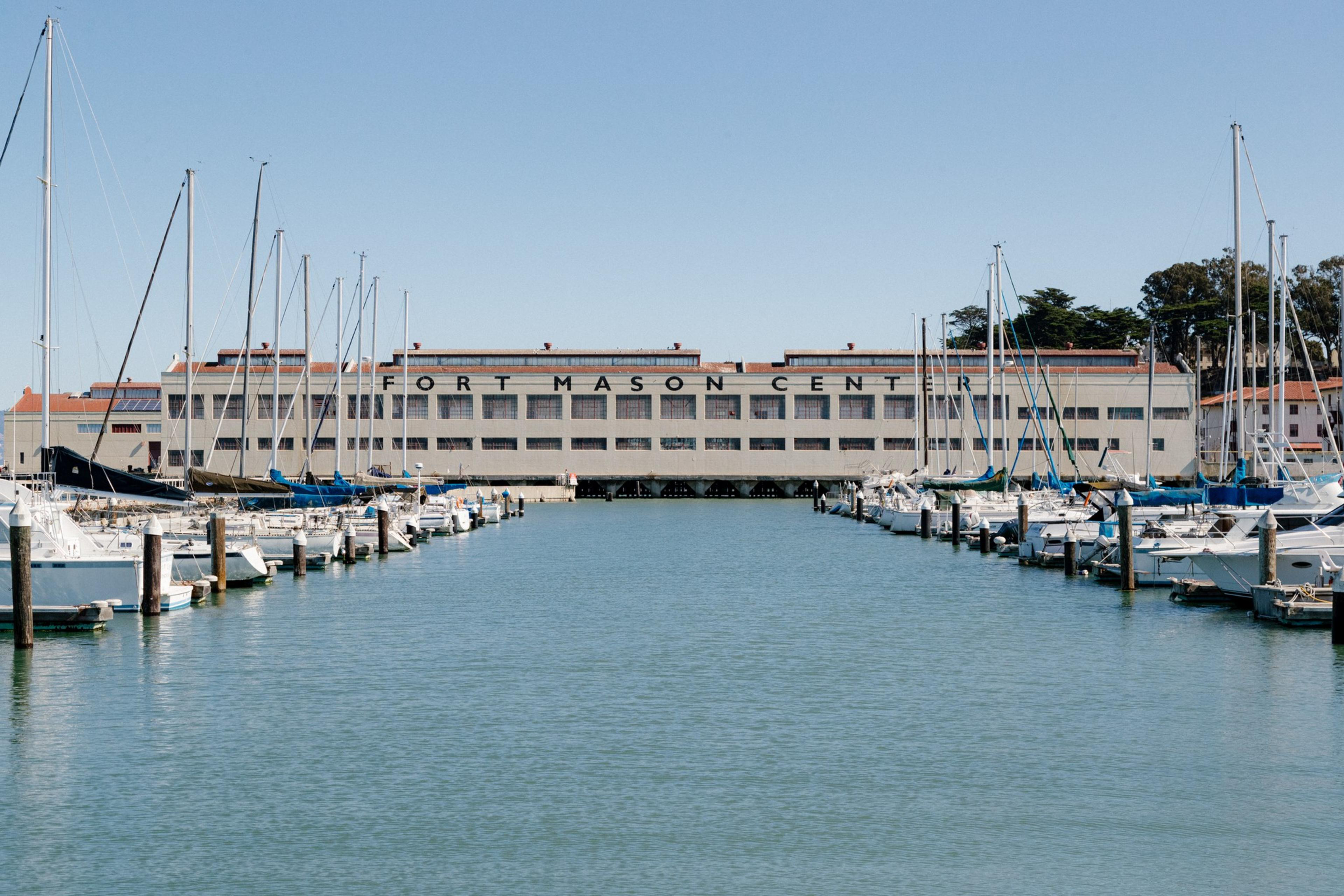 Boats float in the harbor.