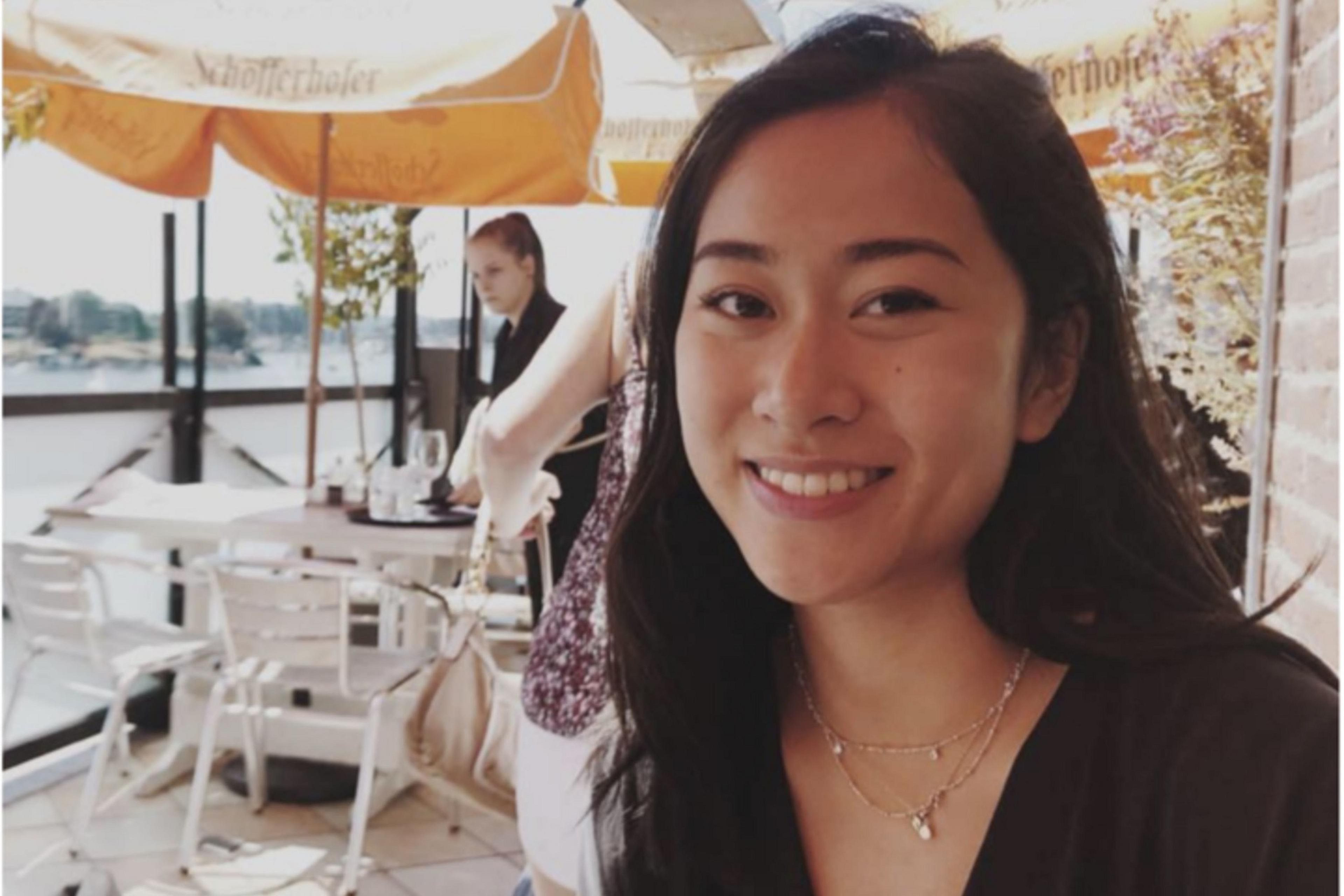 a webpage shows a woman and some text about her work history