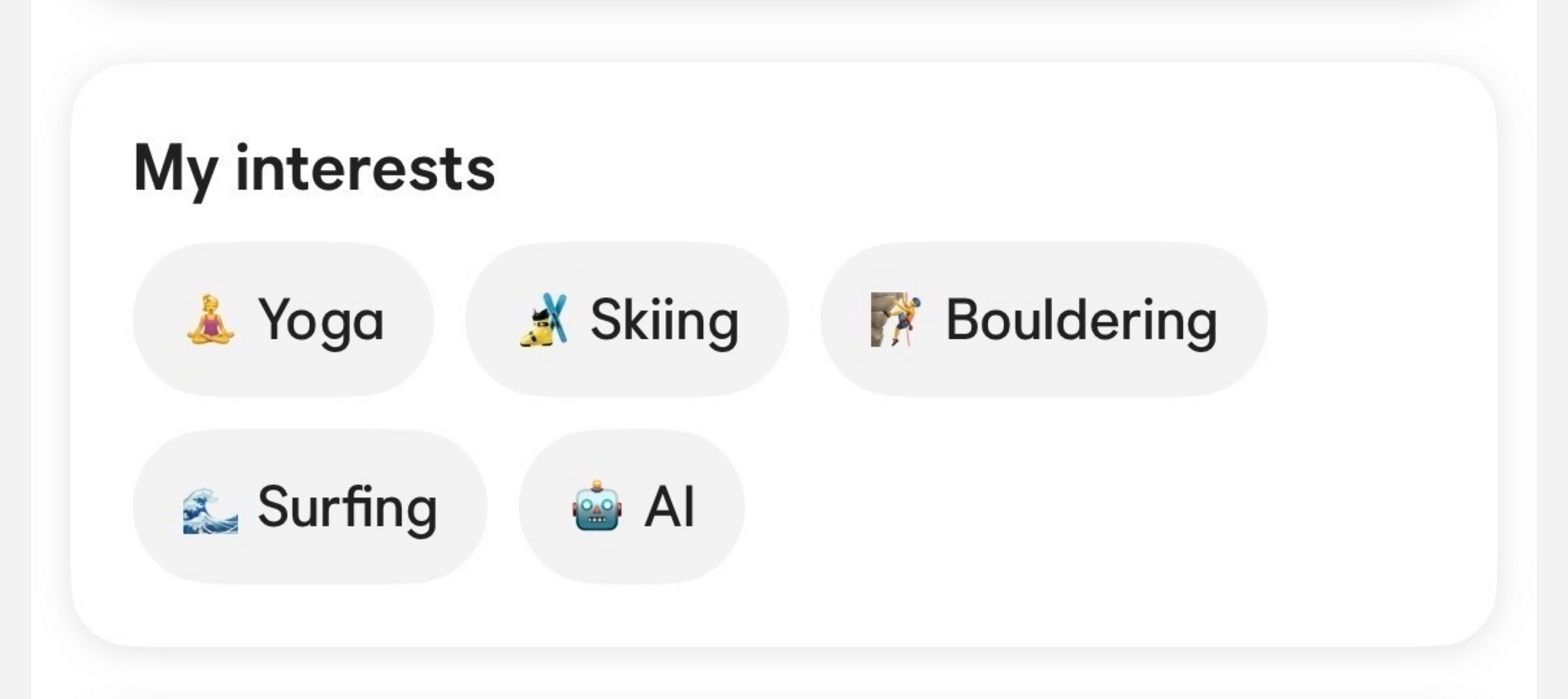 Interests include yoga, skiing, bouldering, surfing, and artificial intelligence, each paired with a related emoji.