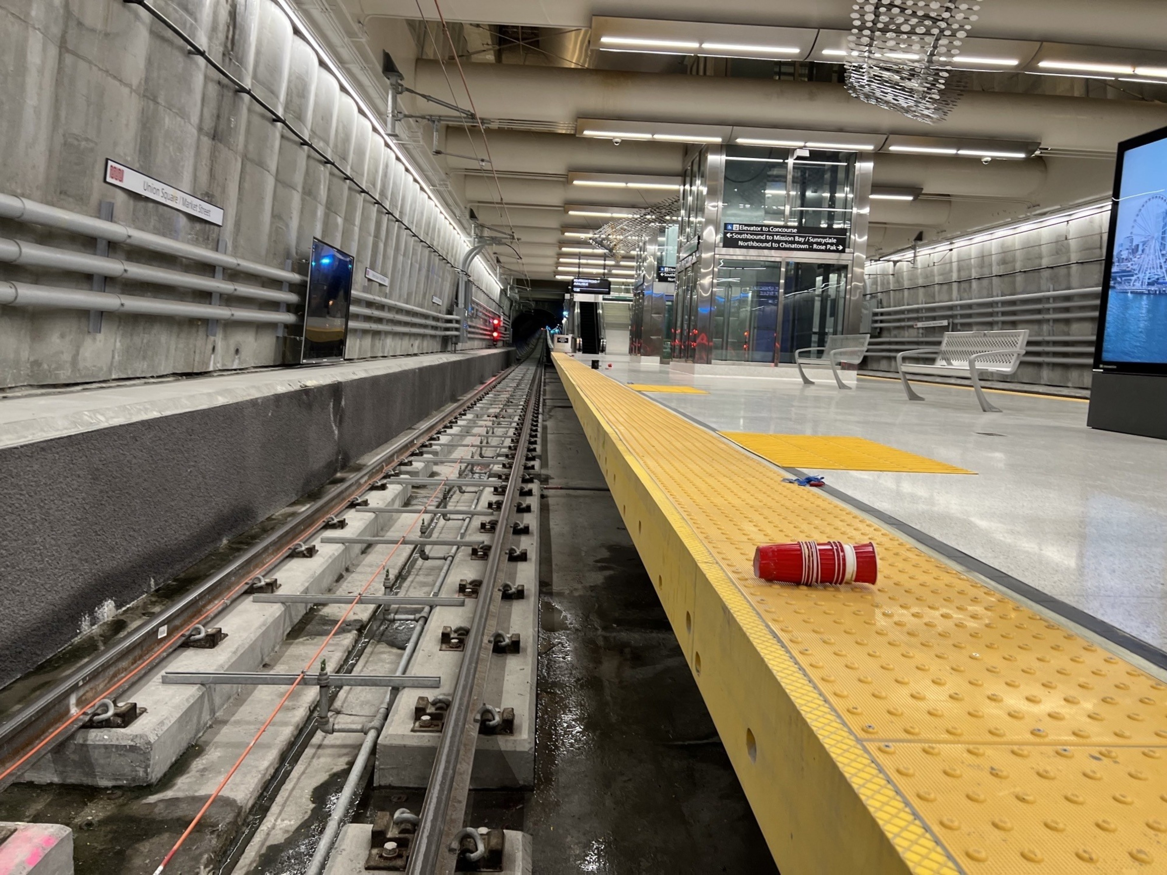 Central Subway platform with party cups