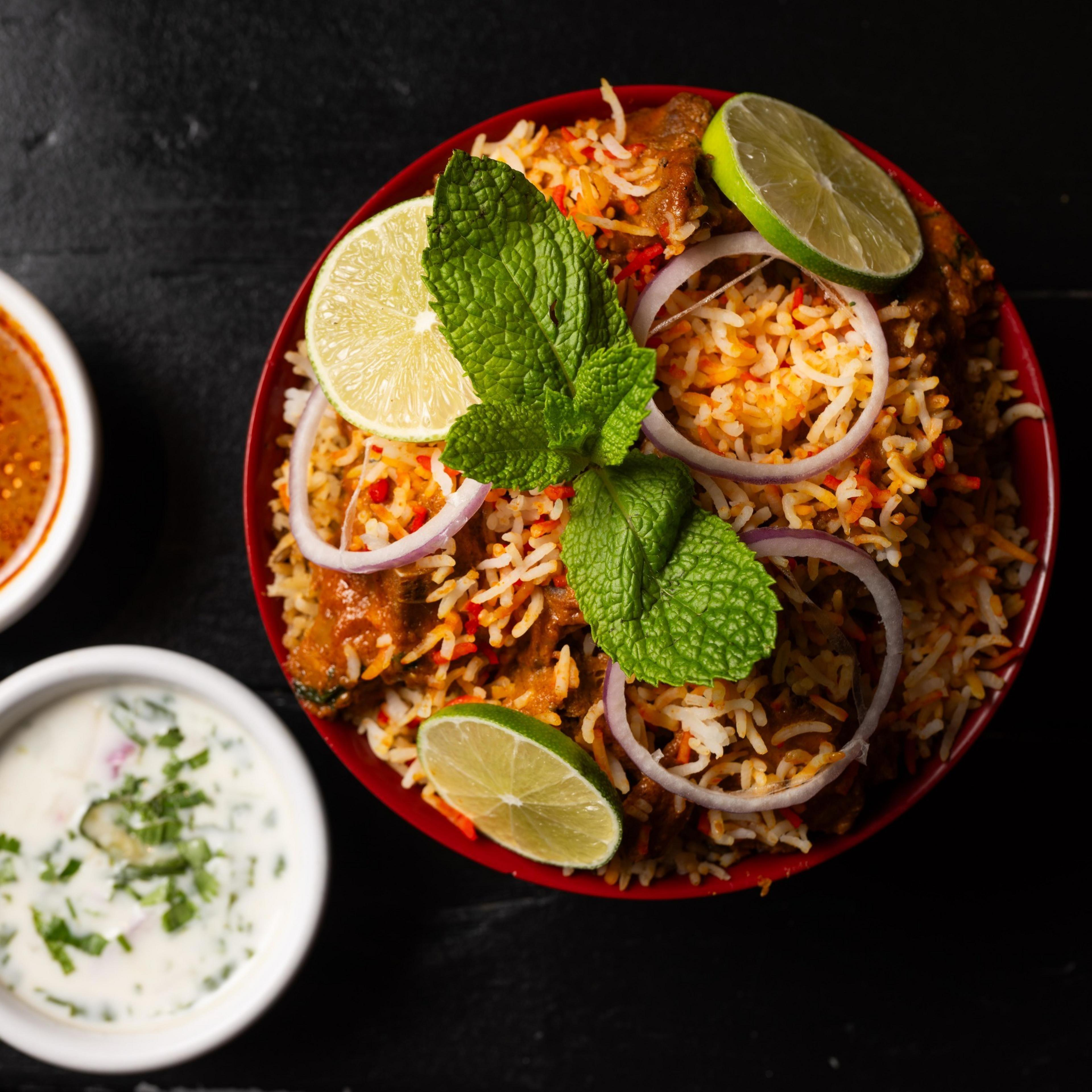 A heaping bowl of goat biriyani is enough for two.