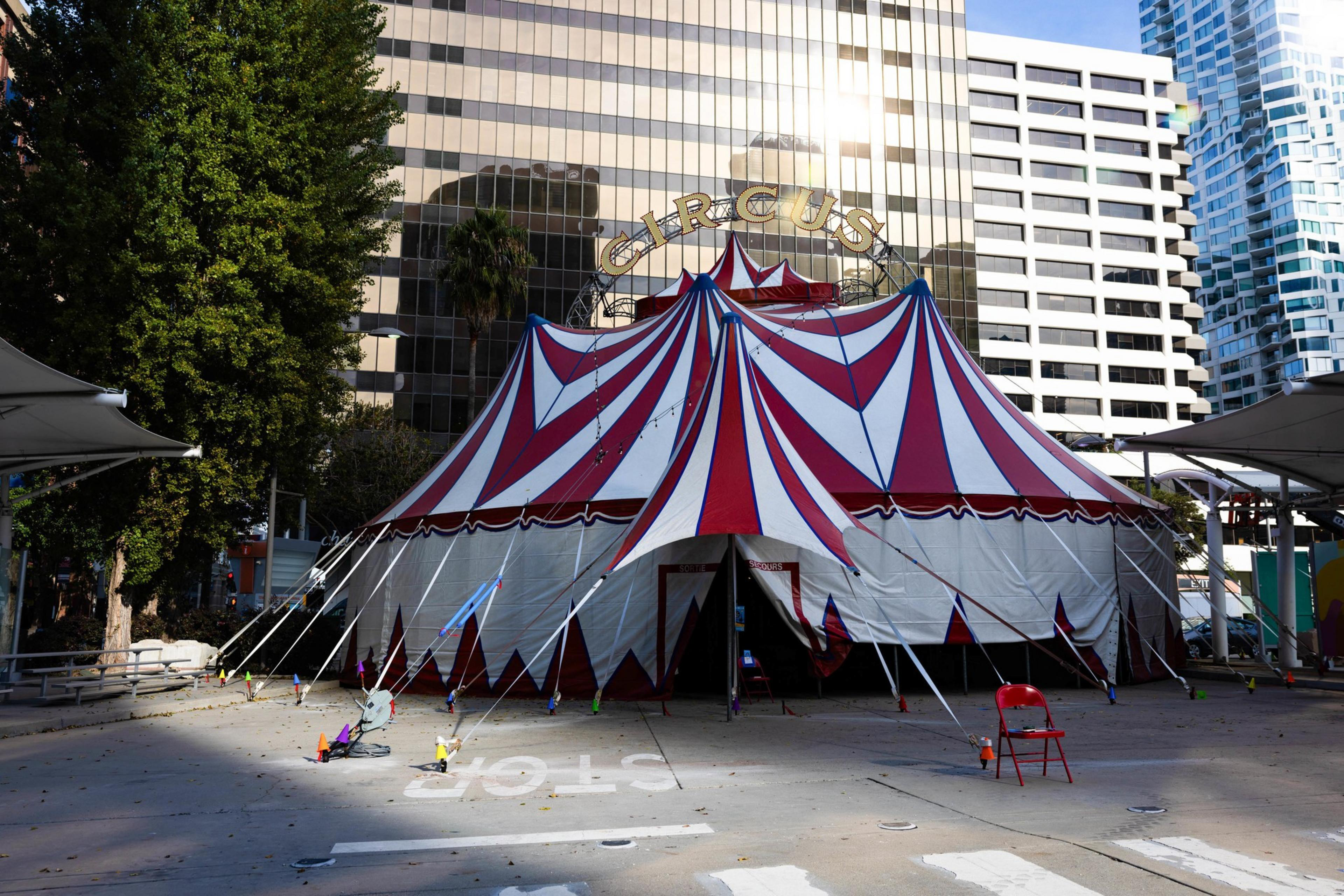 A red and white tent with Circus spelled a t the top at East Cut.