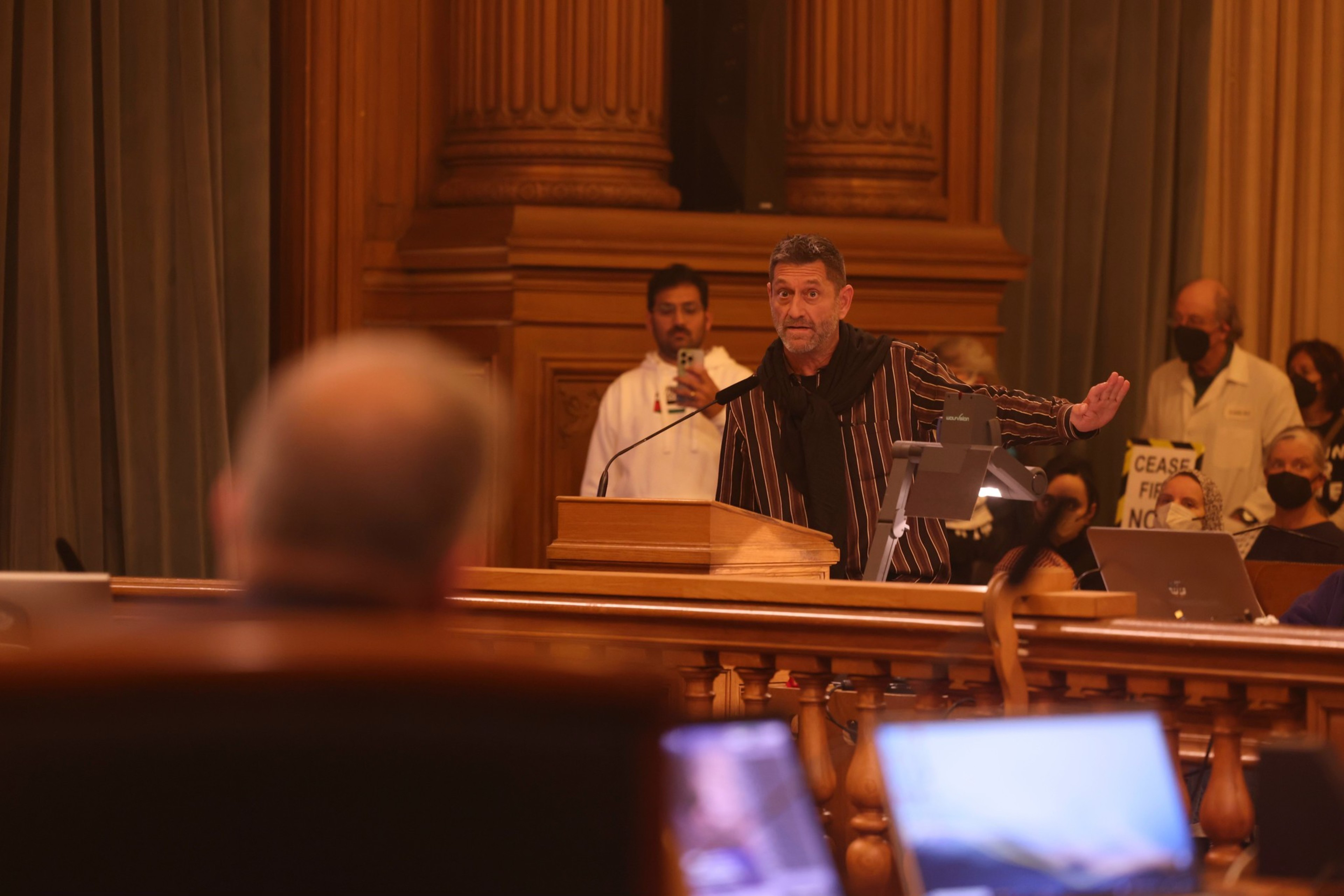 Activists calling for a ceasefire in Gaza pack the Board of Supervisors Rules committee meeting in City Hall on Monday.