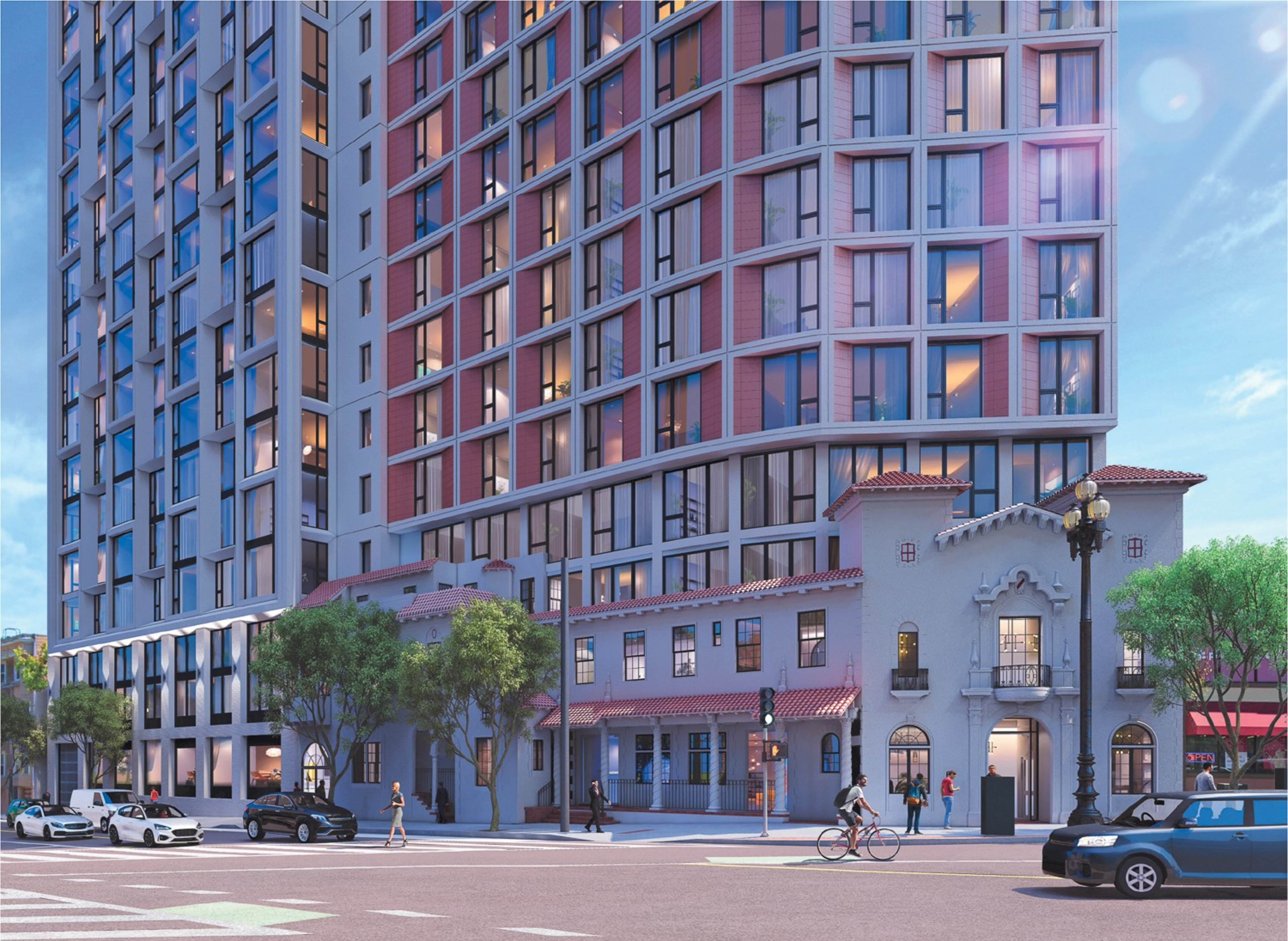The image shows a modern, high-rise building with large windows, partially incorporating a smaller, traditional-style building with red-tile roofs. Cars, trees, and pedestrians are on the street.