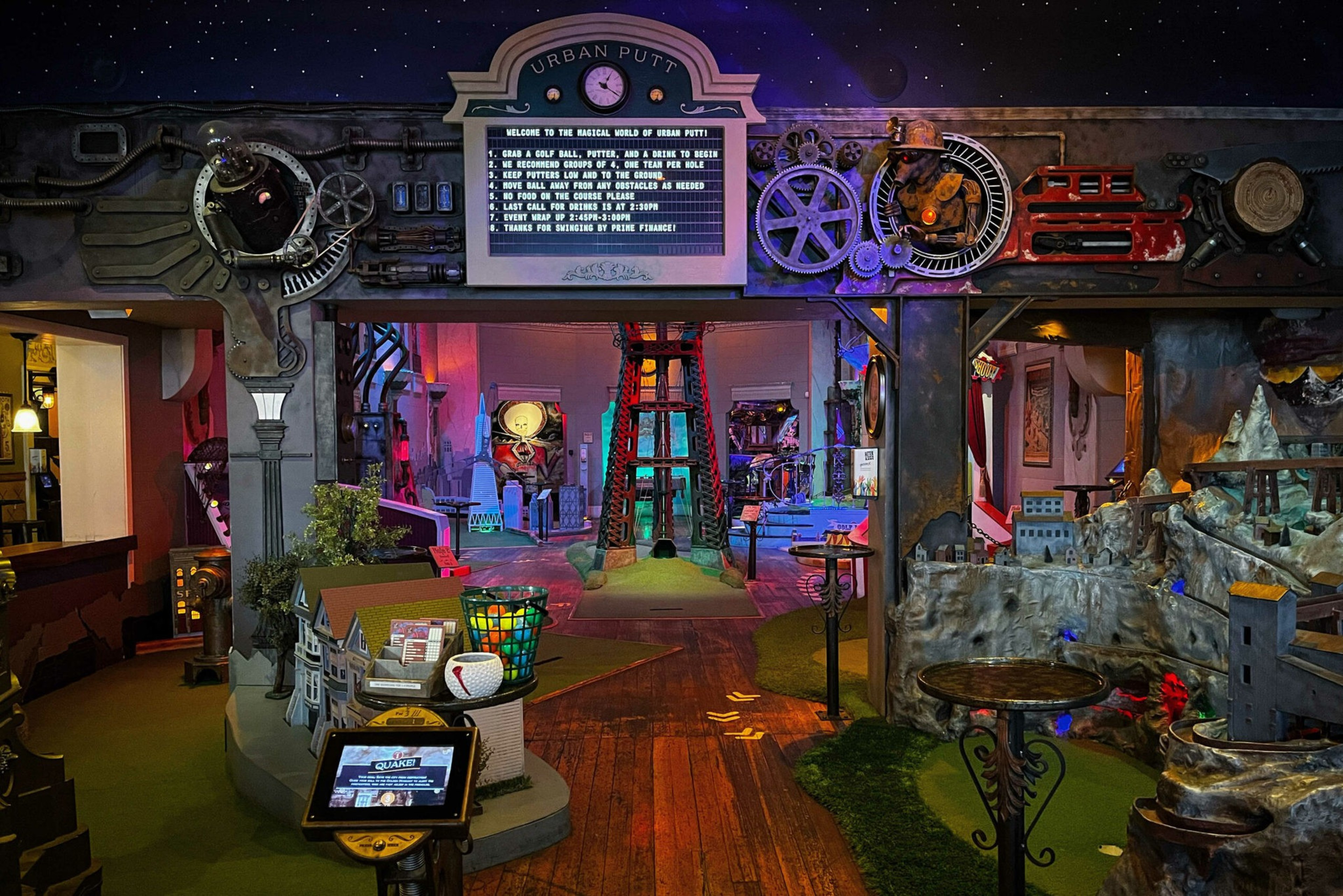 An indoor miniature golf space with a sign saying Urban Putt in the background.