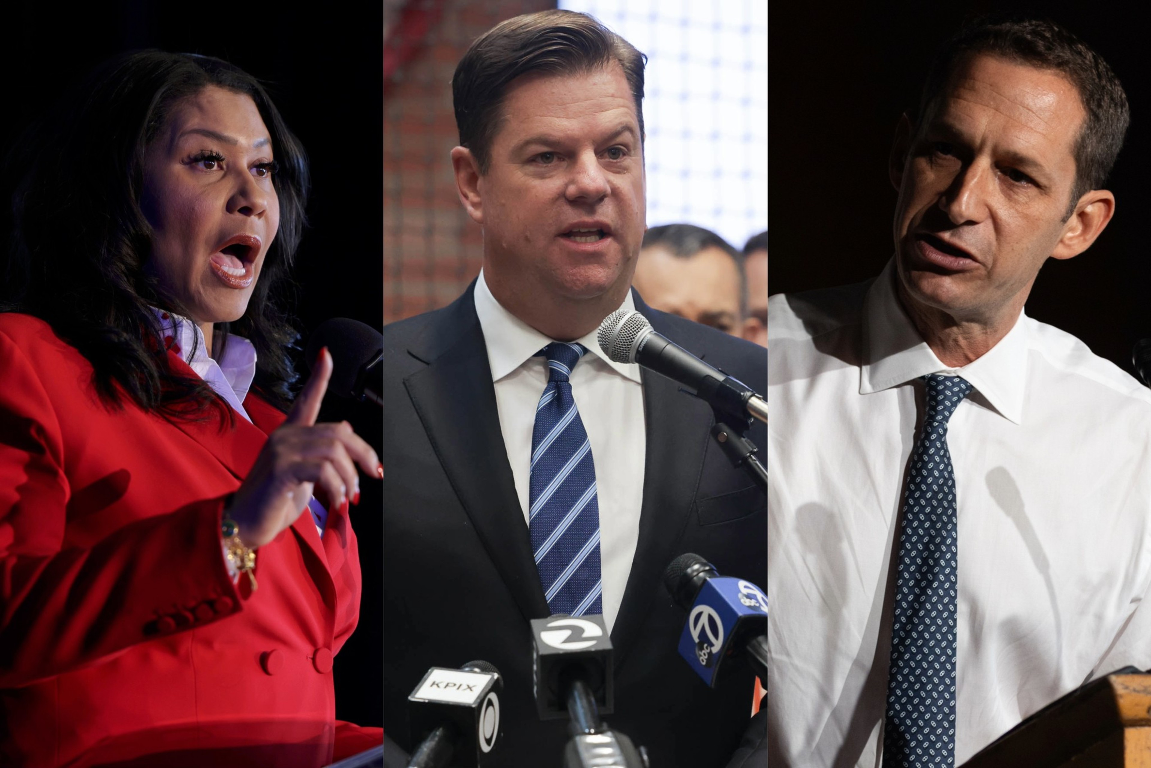 Three people, likely politicians, speaking with microphones; a woman in red, a man in a blue suit, another in a white shirt, all seem engaged.