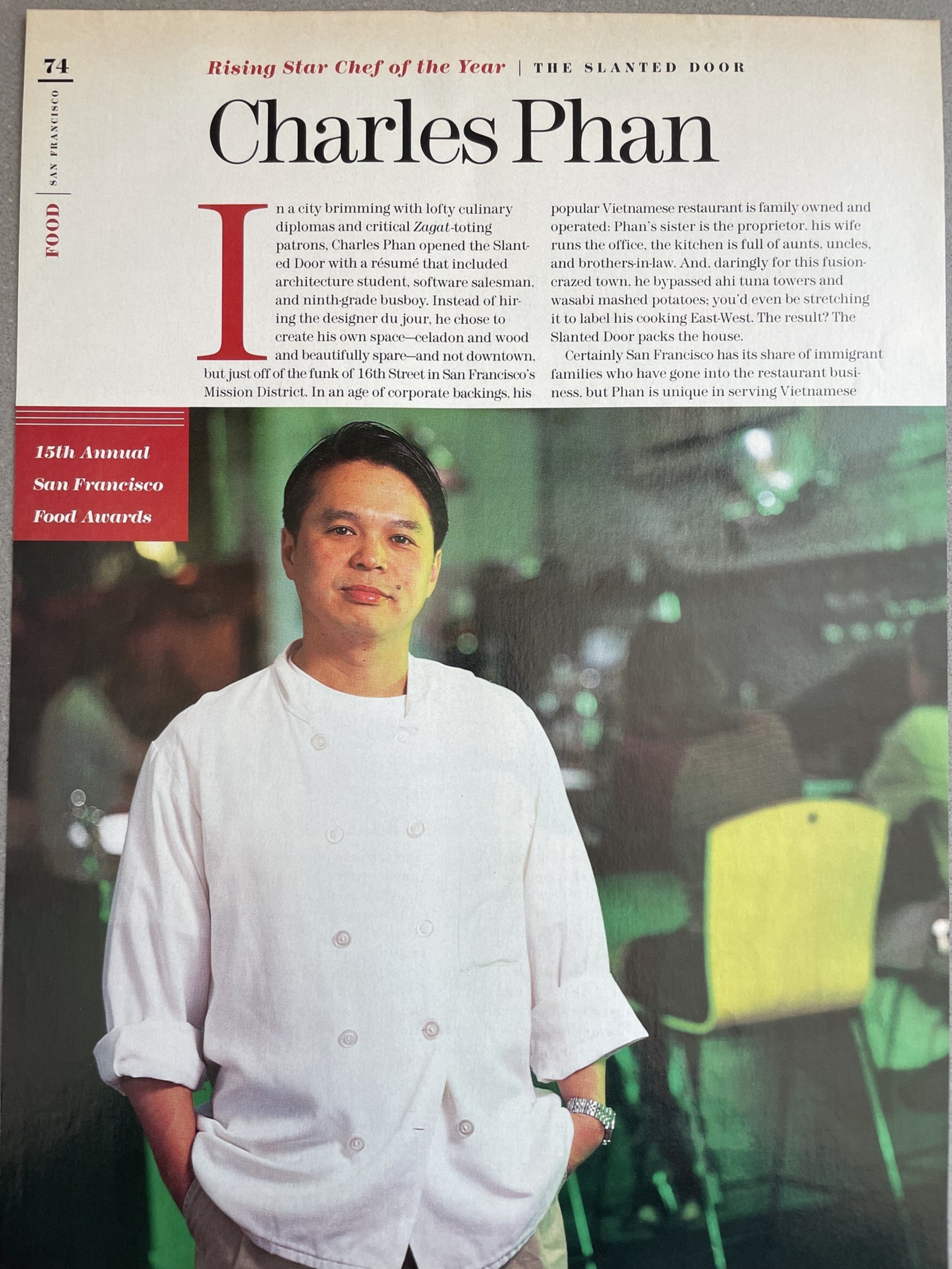 A chef in a white coat stands confidently with hands in pockets. Text around him discusses the Slanted Door restaurant and awards for culinary achievements.