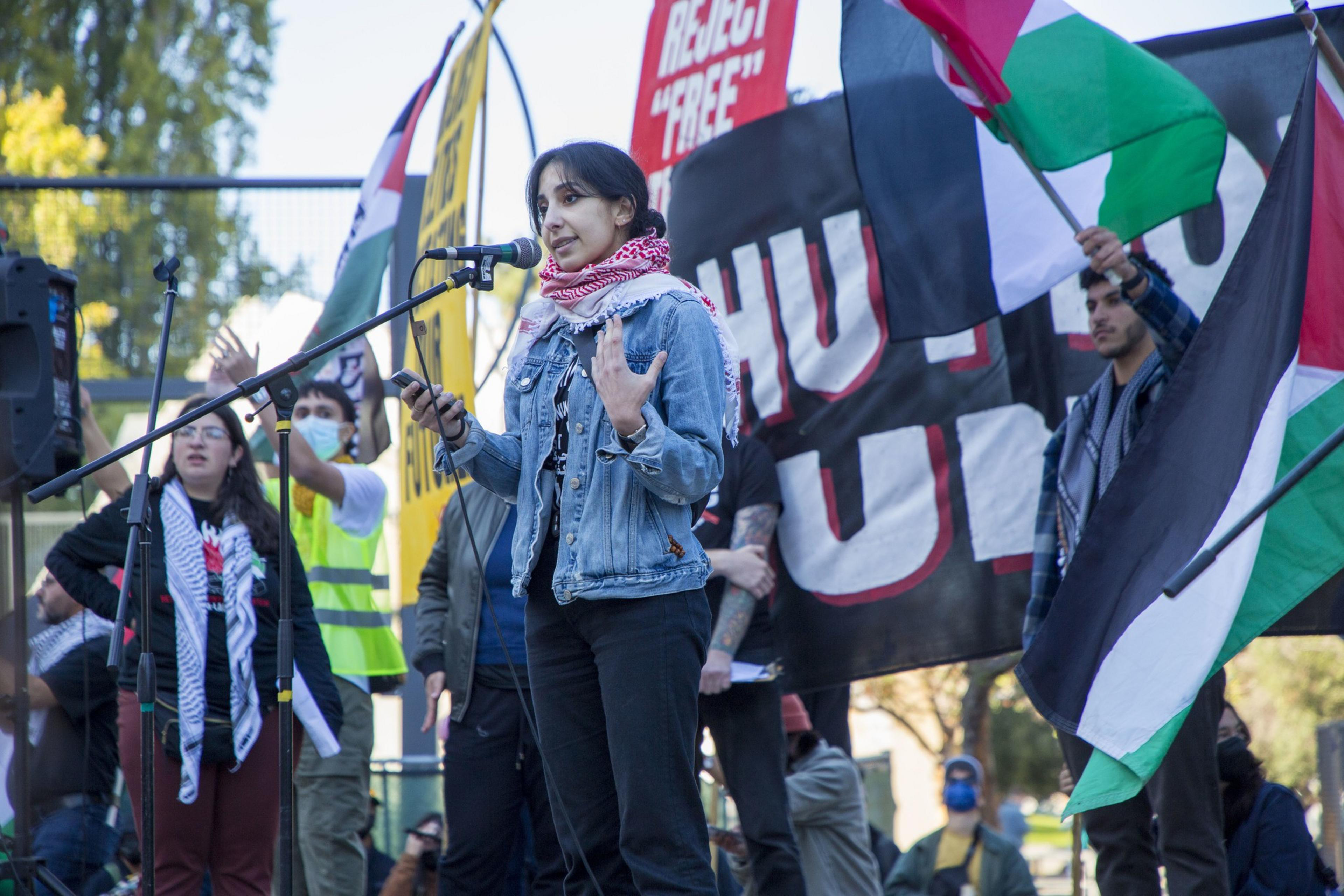 A speaker gives a speech at the No 2 APEC protest.