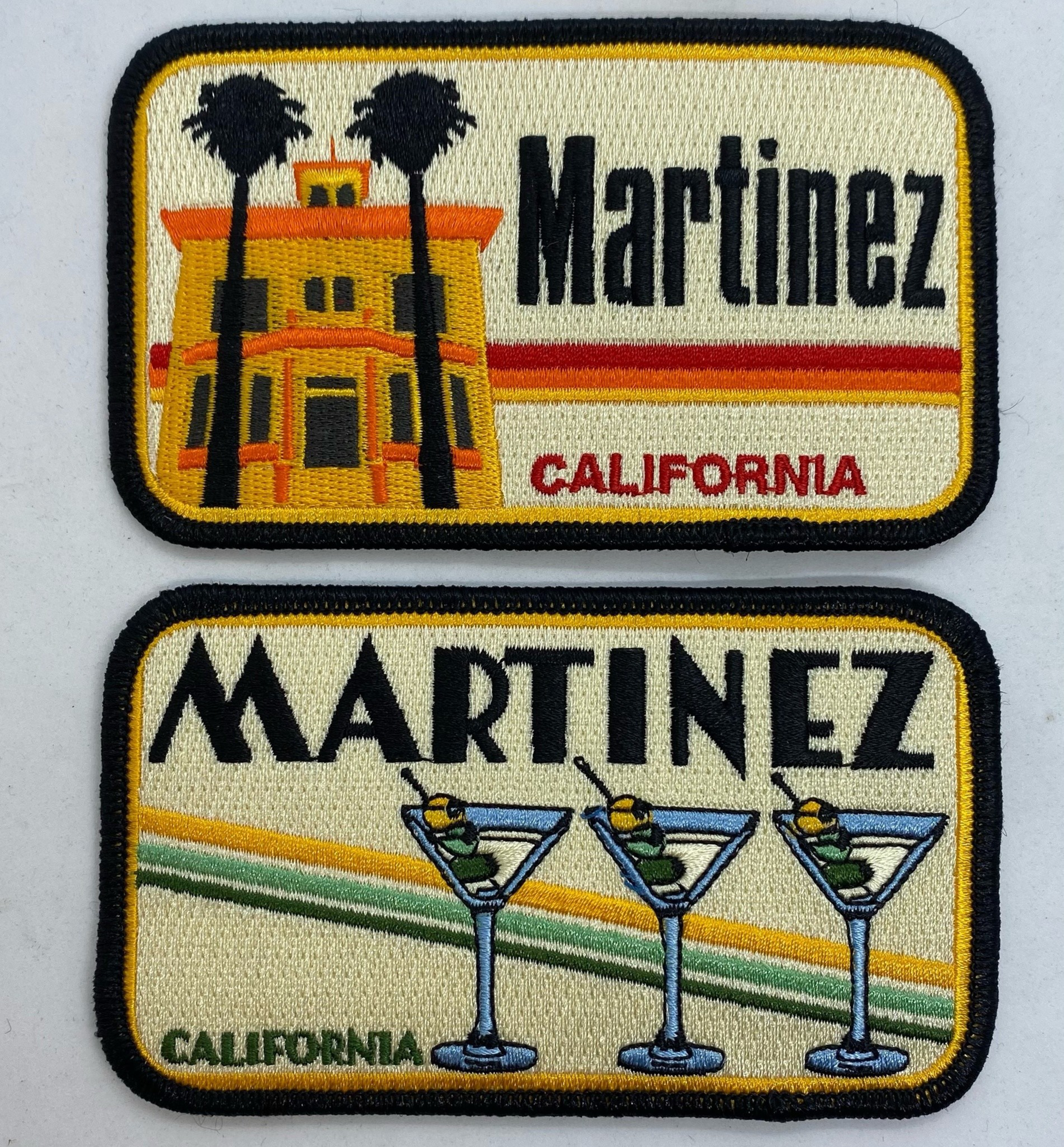Two embroidered patches with "Martinez California" text; one features a yellow building with two palm trees, the other shows three martini glasses with olives.