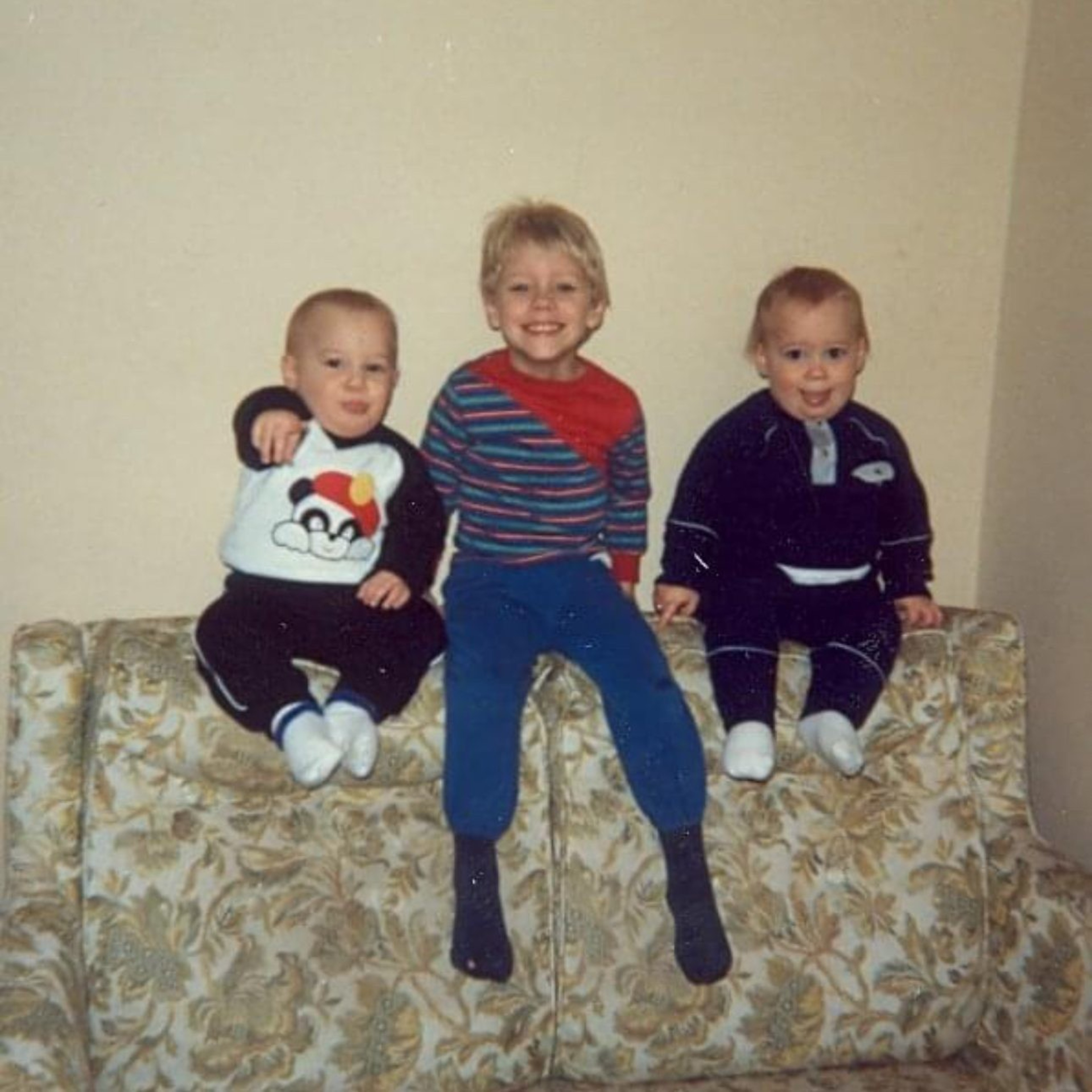 A photo of 3 little boys